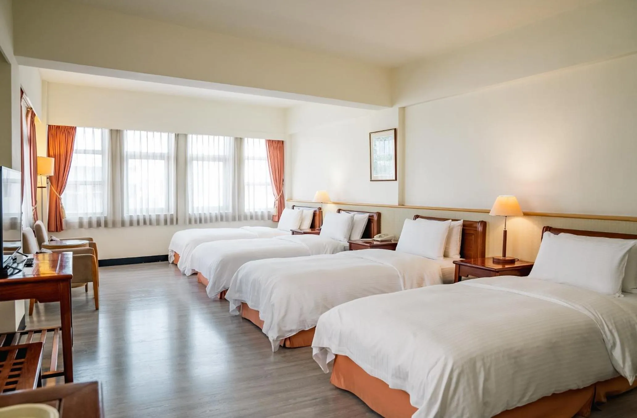 Standard Quadruple Room with Bath Tub in East Coast Hotel