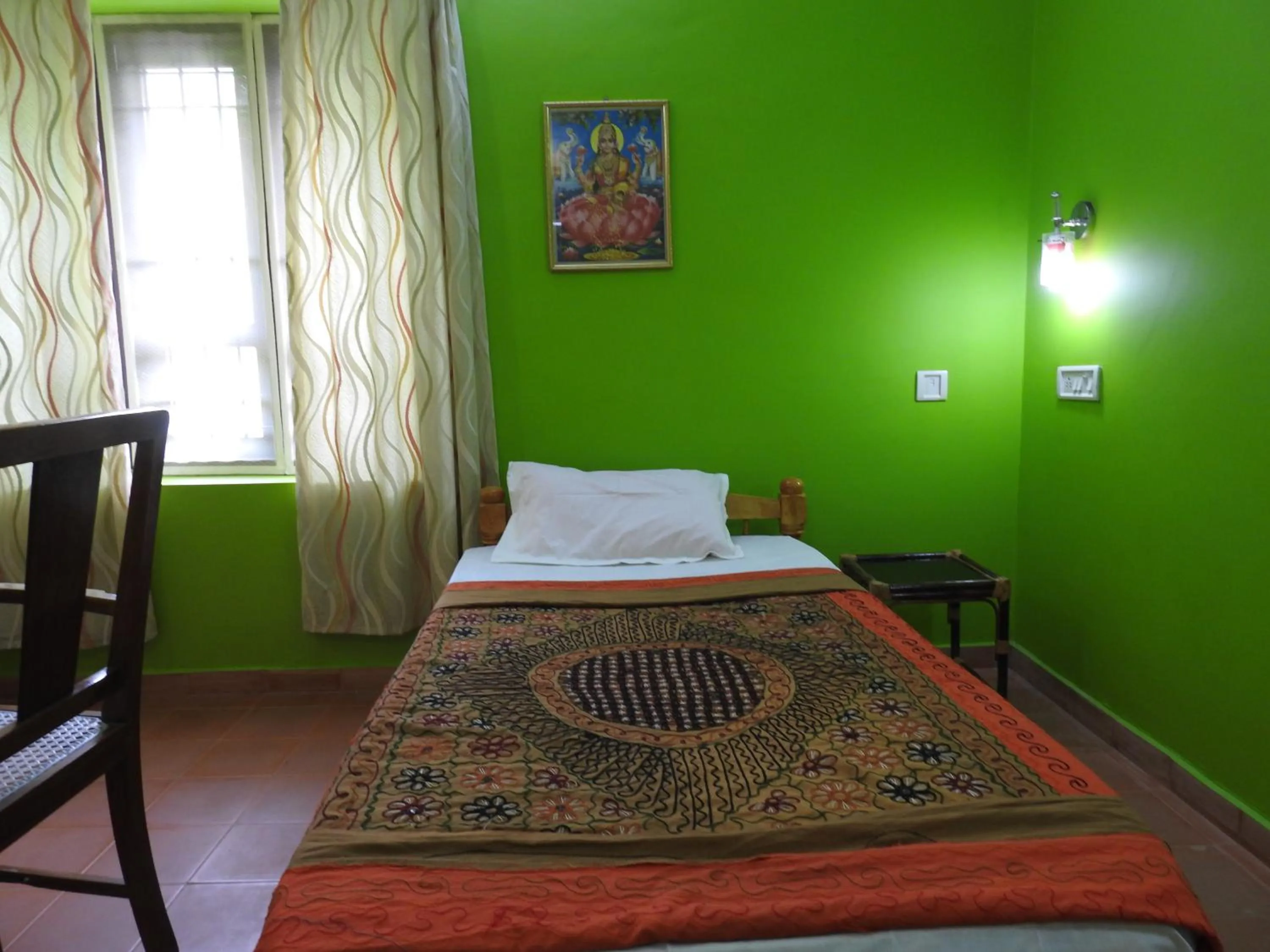 Bed in Kadalamma Beach Homestay