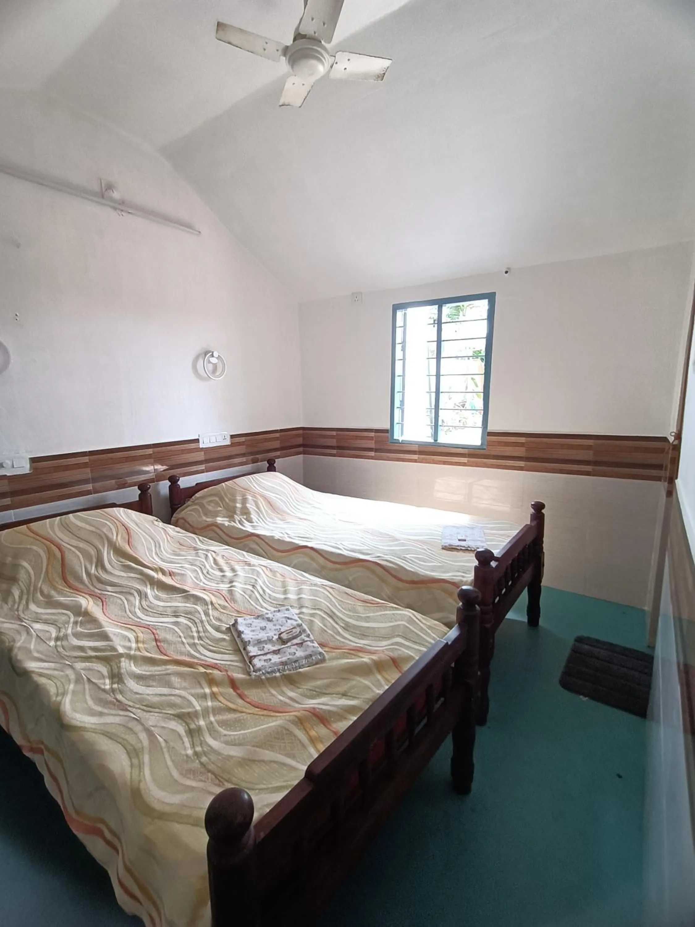 Photo of the whole room, Bed in Kadalamma Beach Homestay