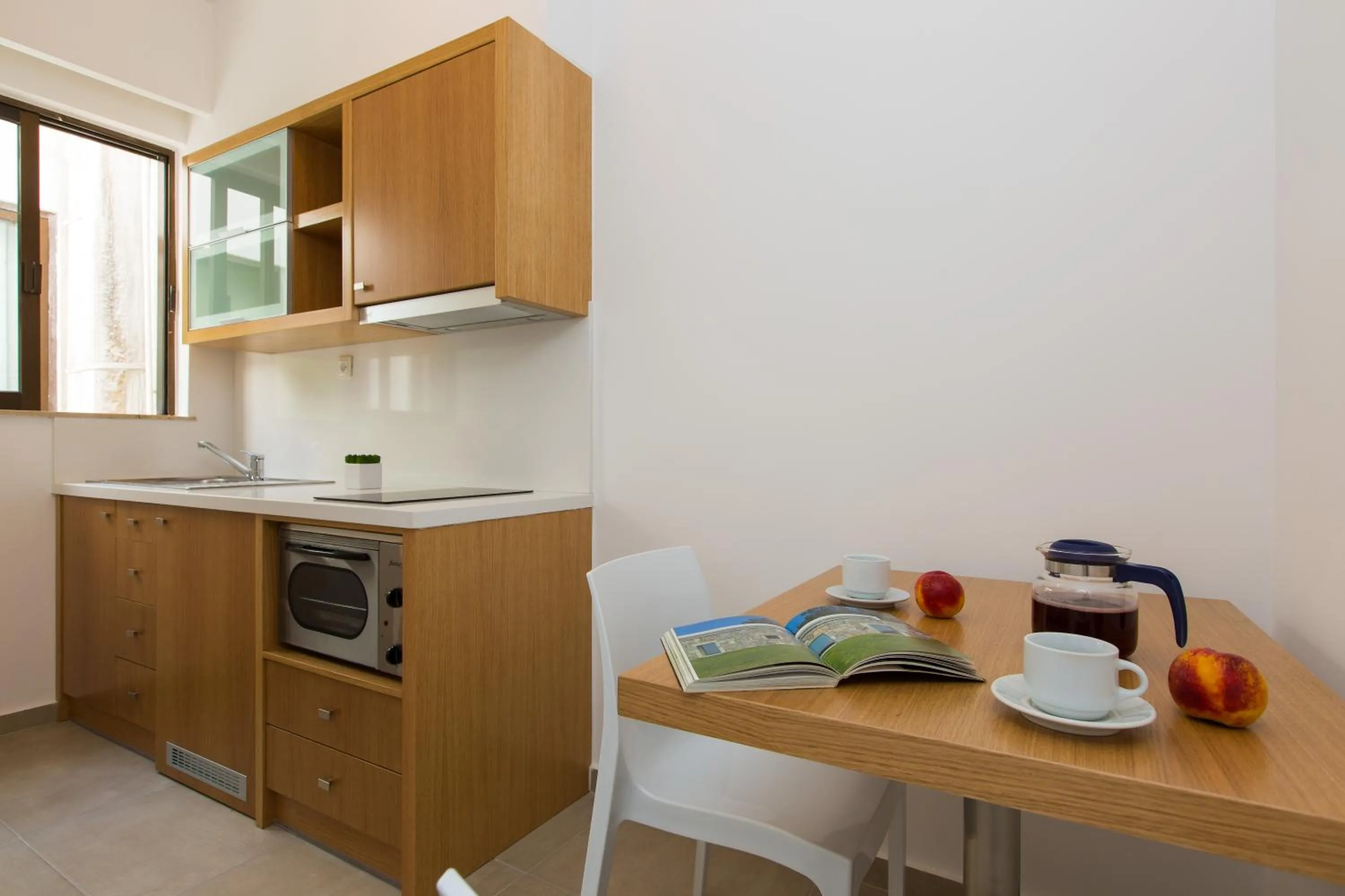 Kitchen or kitchenette in Eltina Hotel
