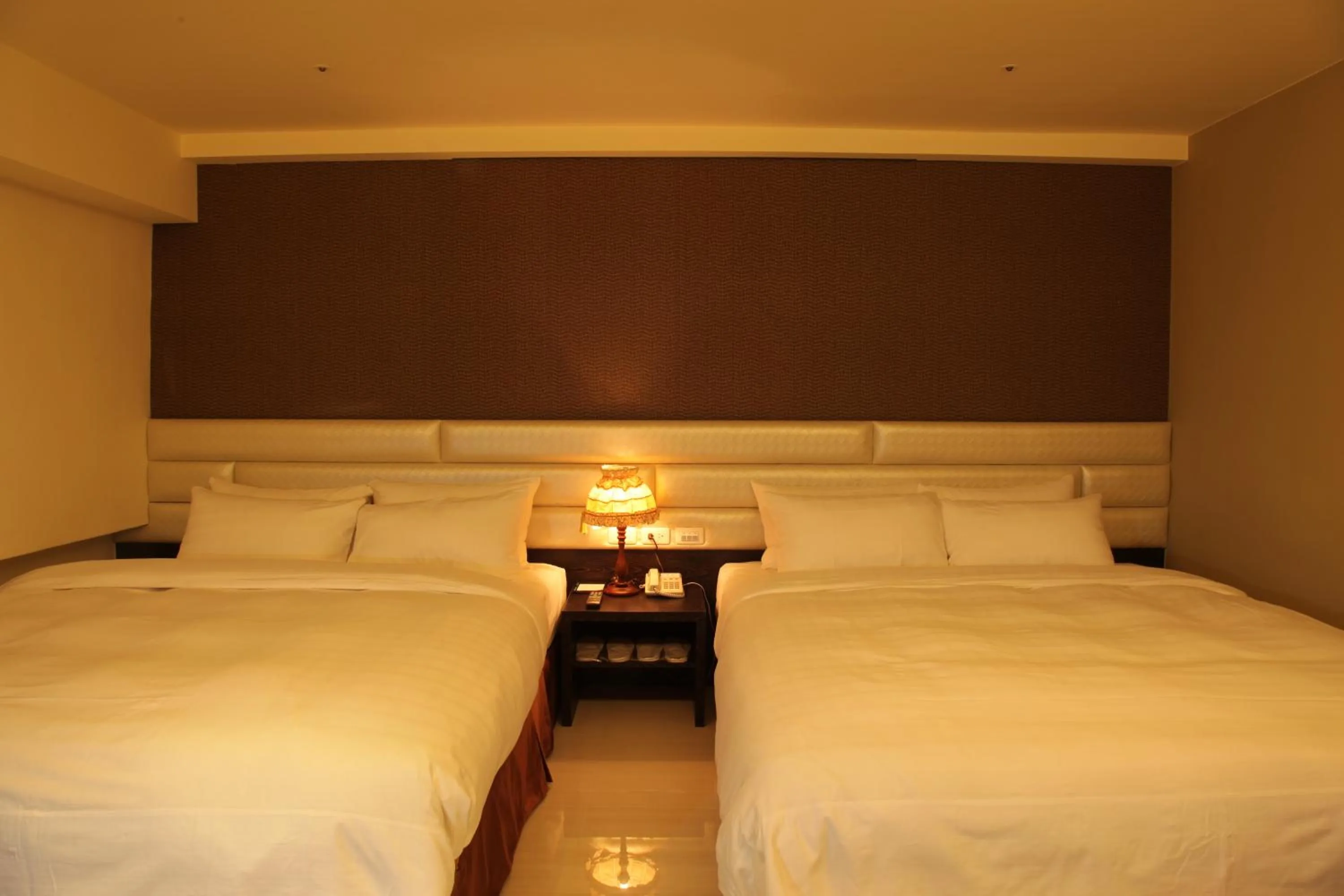 Bed in Nest Hotel