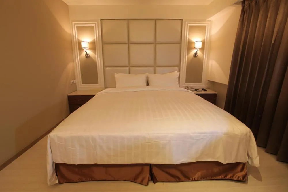 Bed in Nest Hotel