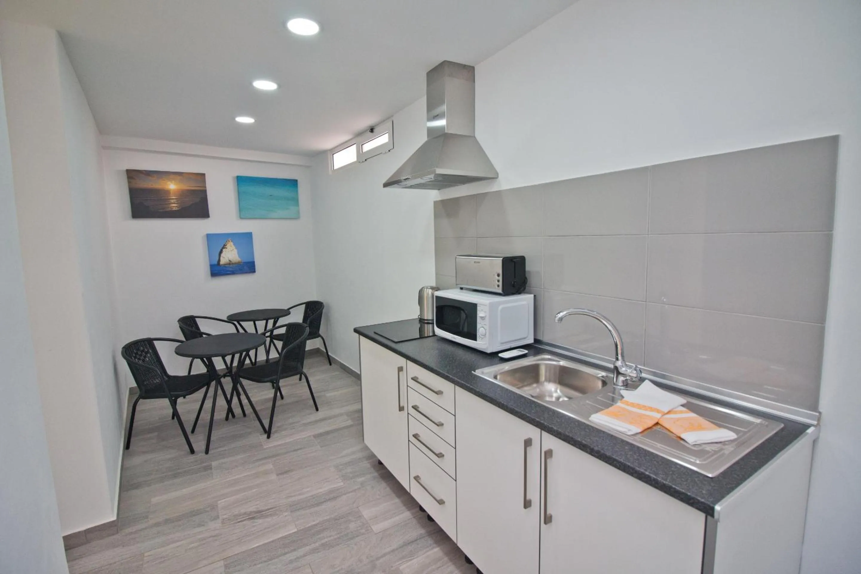 Kitchen or kitchenette in New Village Guest House