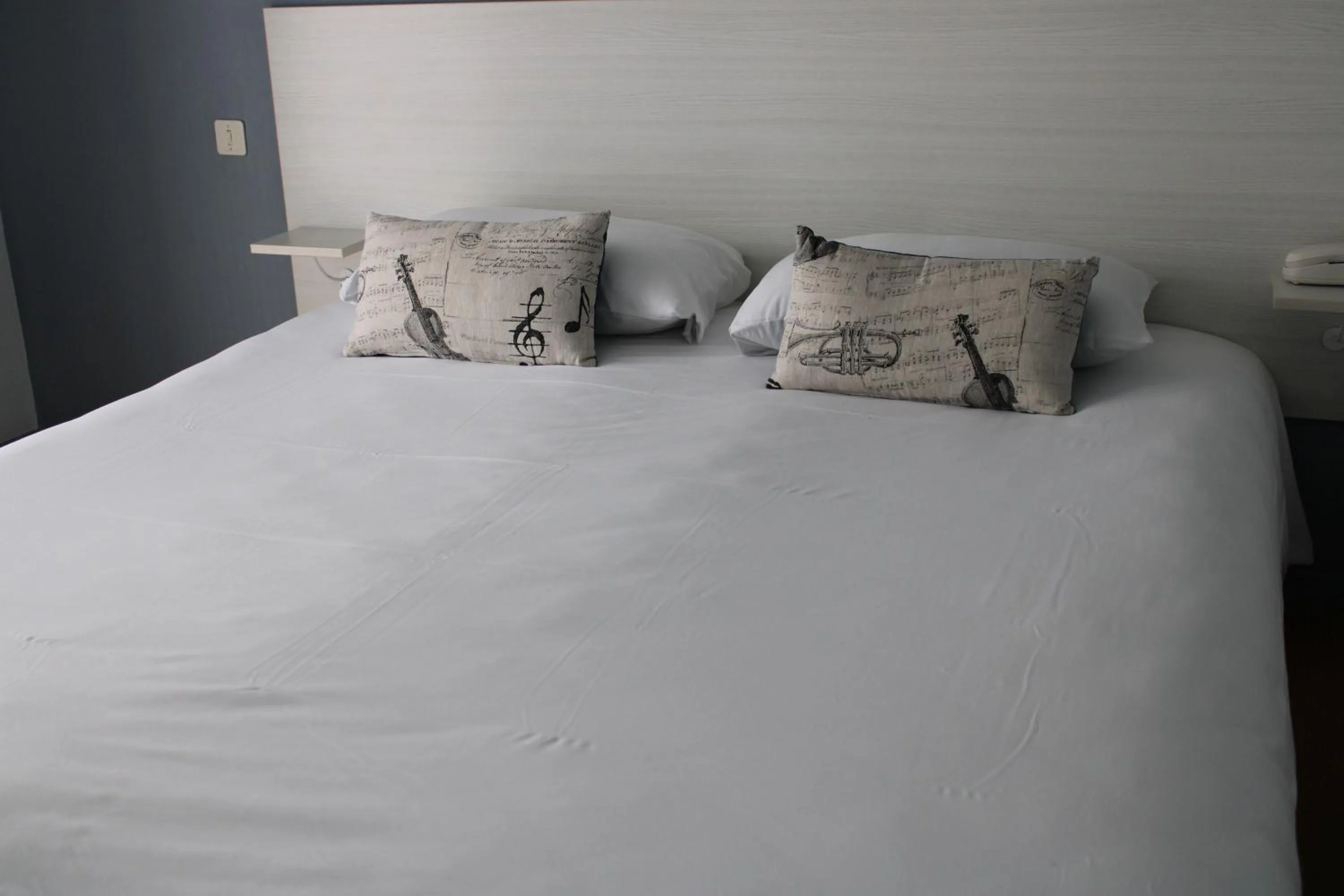 Bed in Hôtel des Dunes Noirmoutier