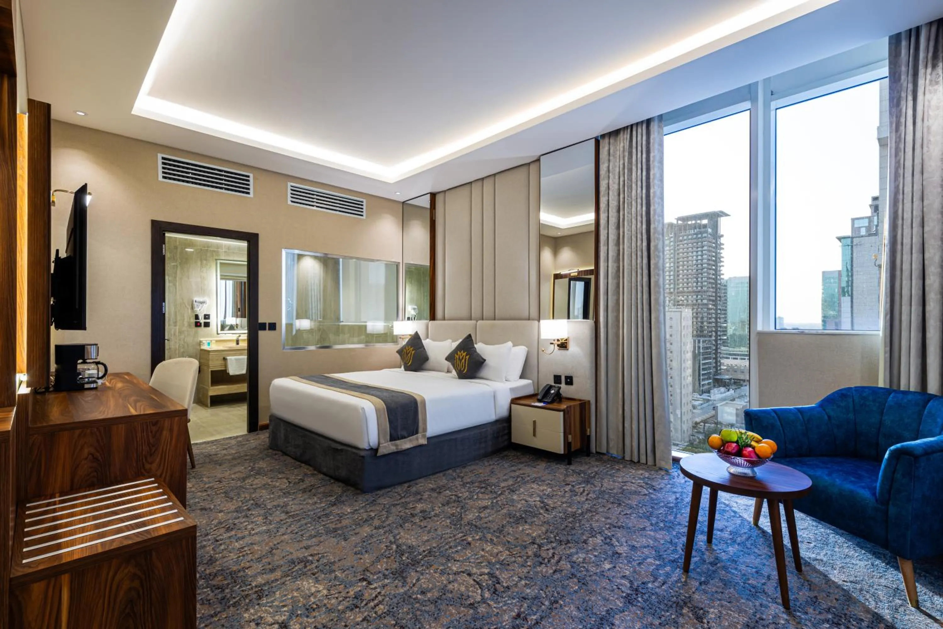 Bed in Crown Rose Al Sahafa Hotel