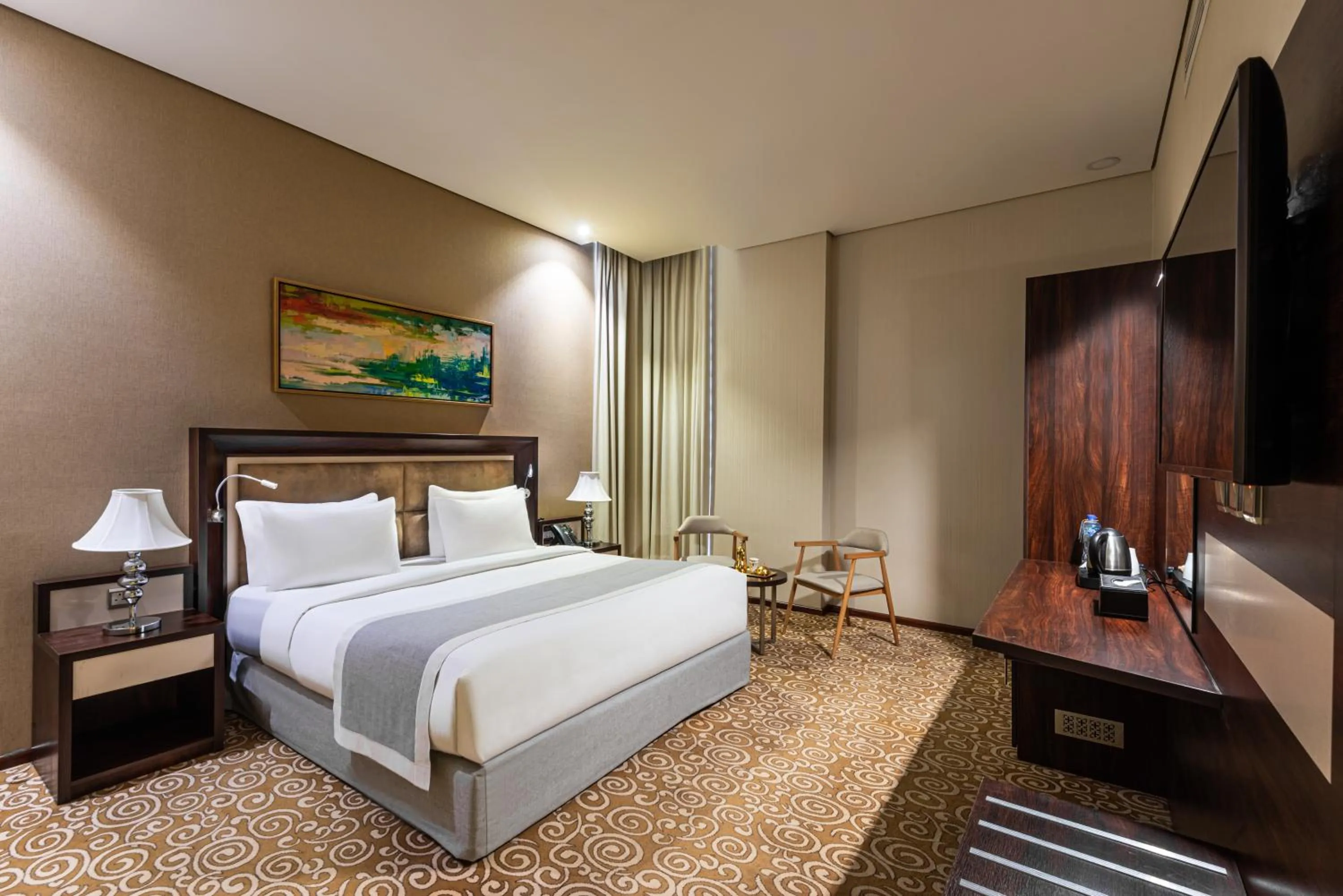 Bed in Crown Rose Al Sahafa Hotel