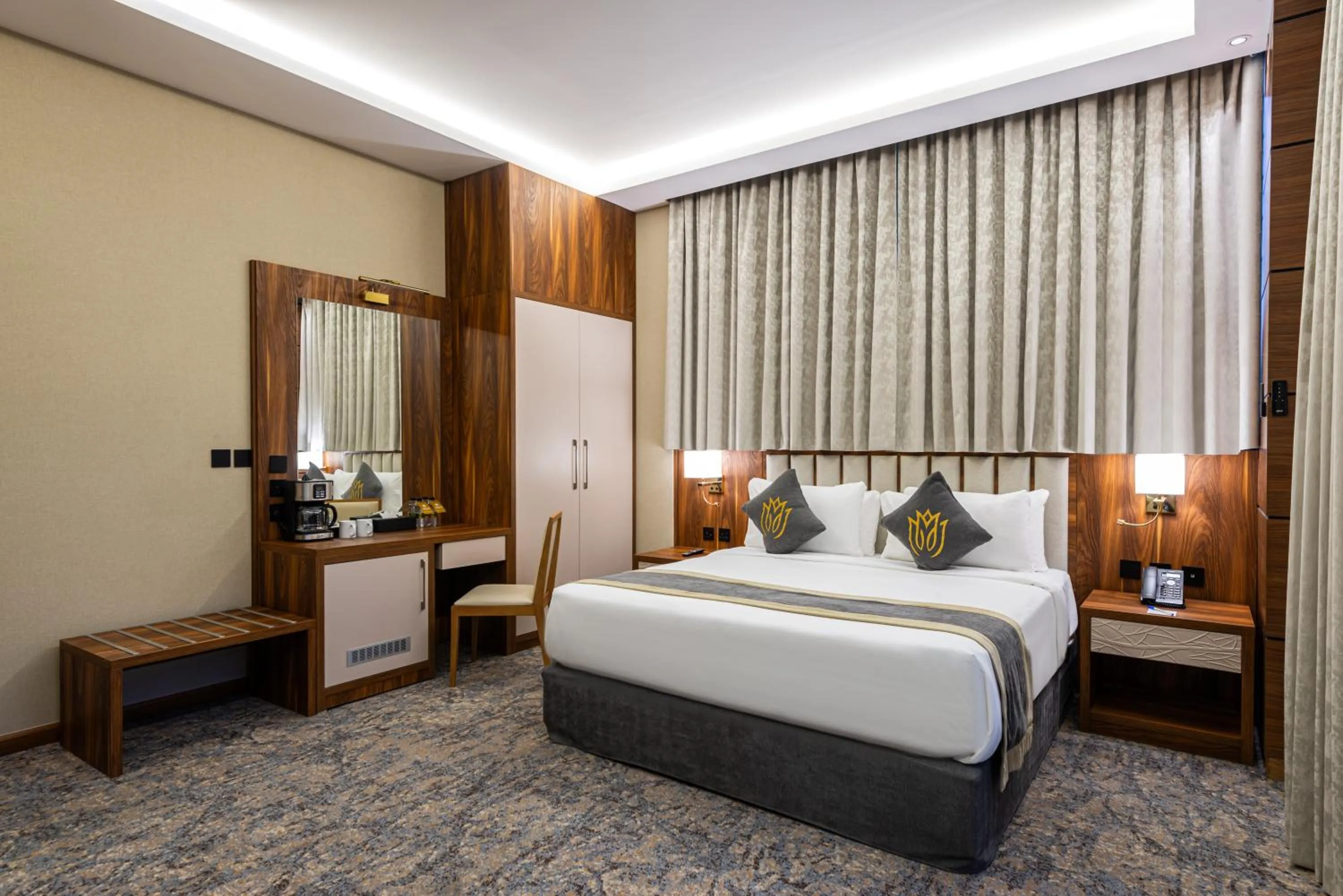 Bed in Crown Rose Al Sahafa Hotel