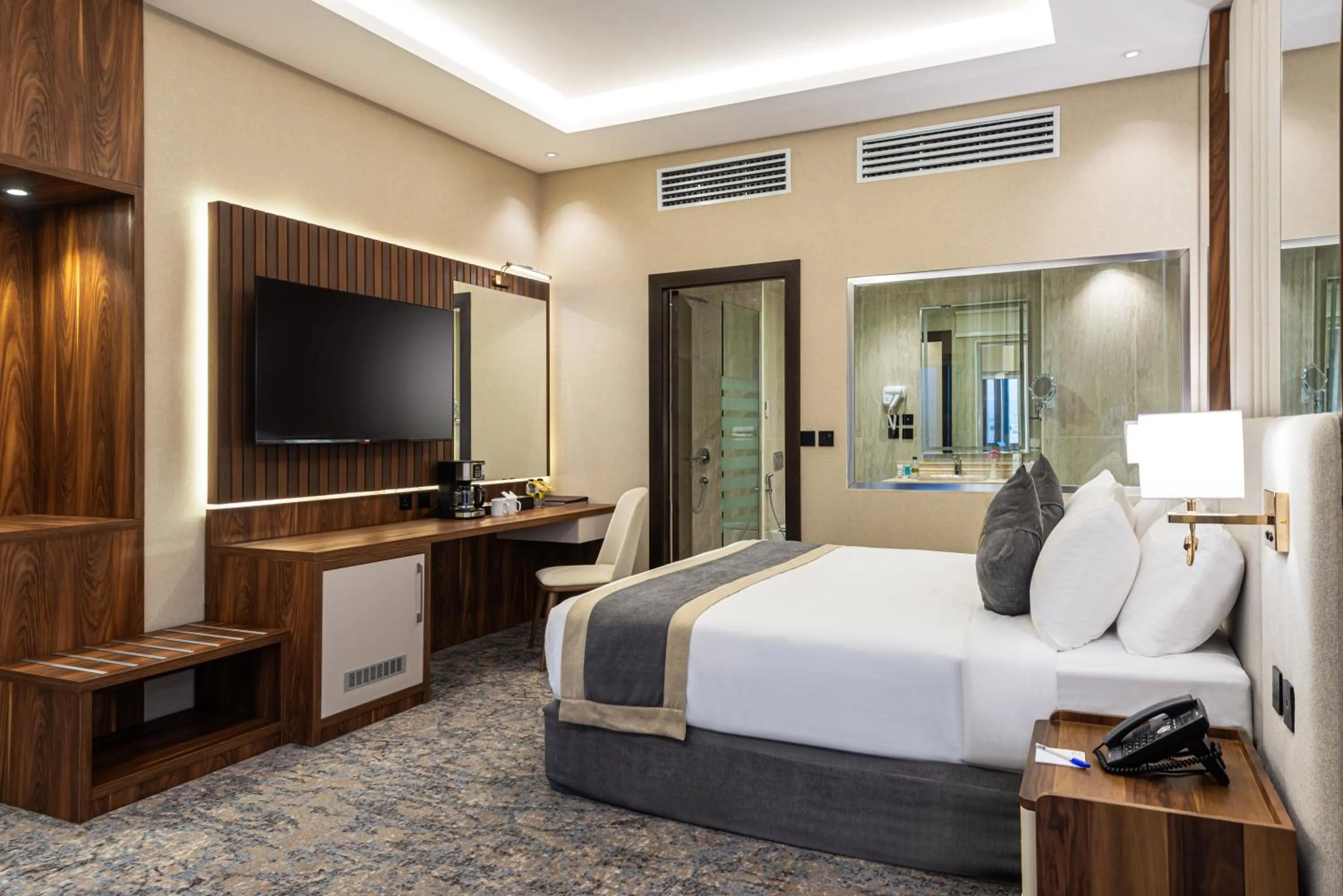 Bed in Crown Rose Al Sahafa Hotel