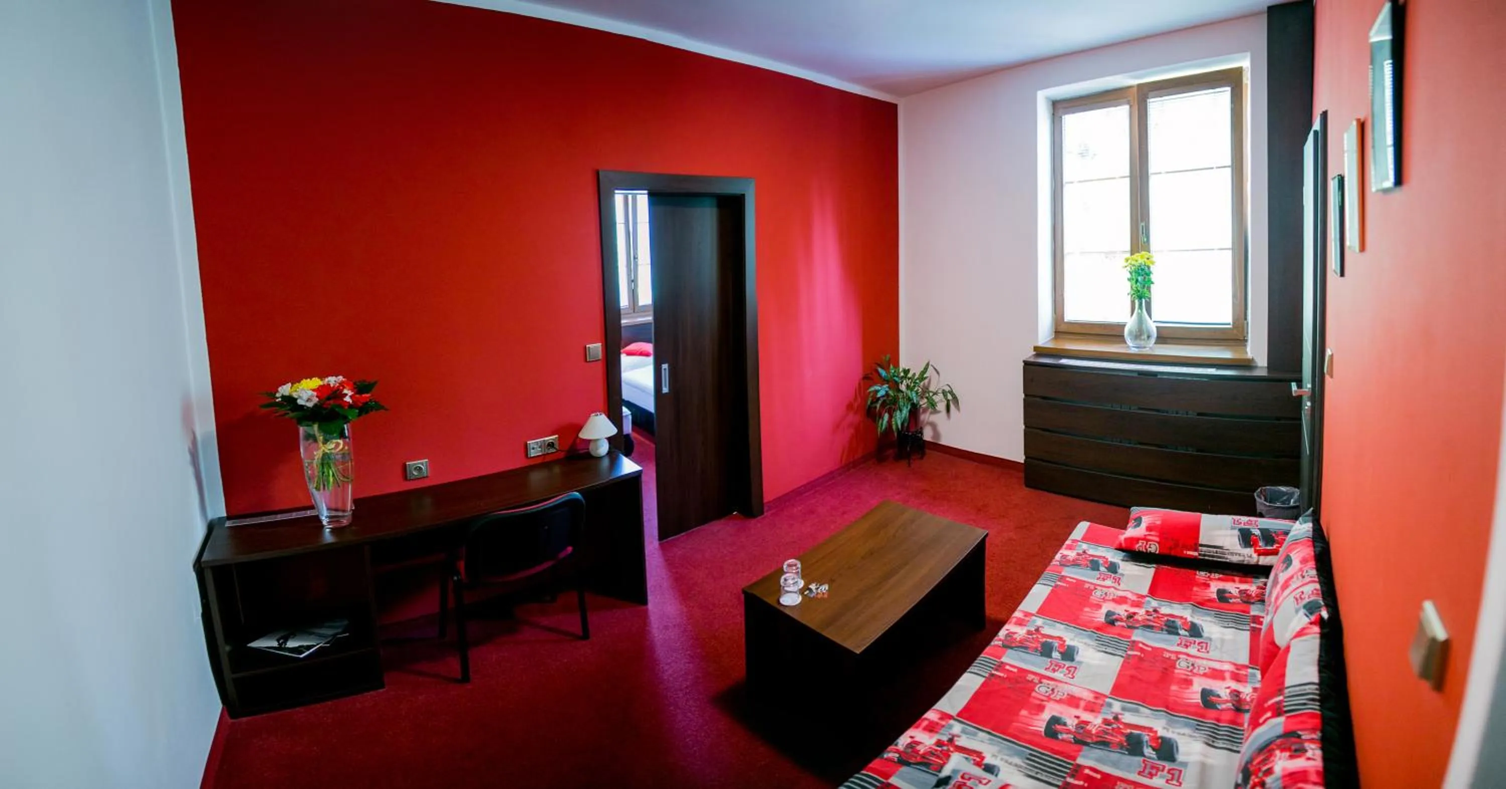 Living room, Bed in Hotel Best