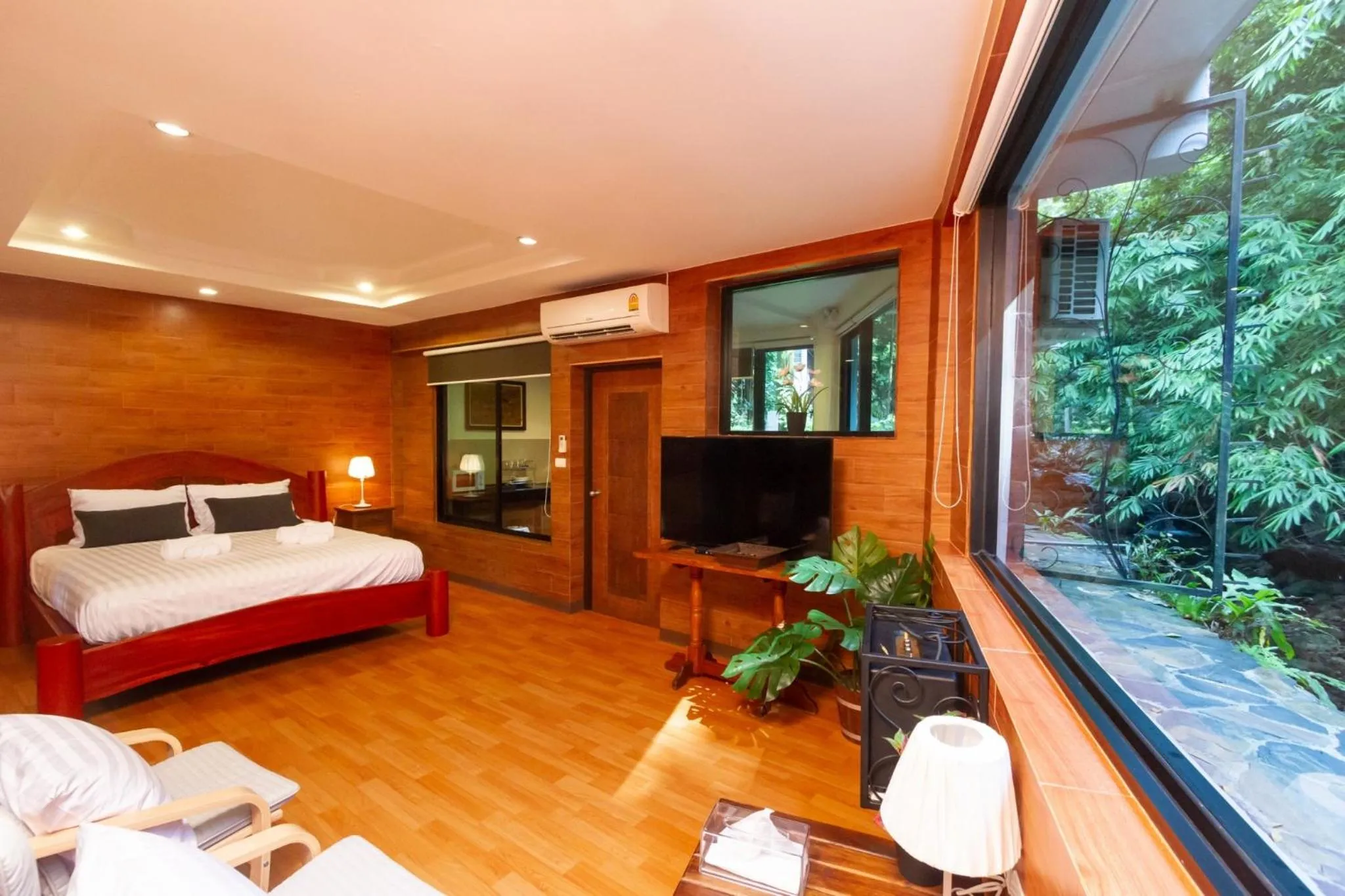 Bed in Namtok Sarika Resotel