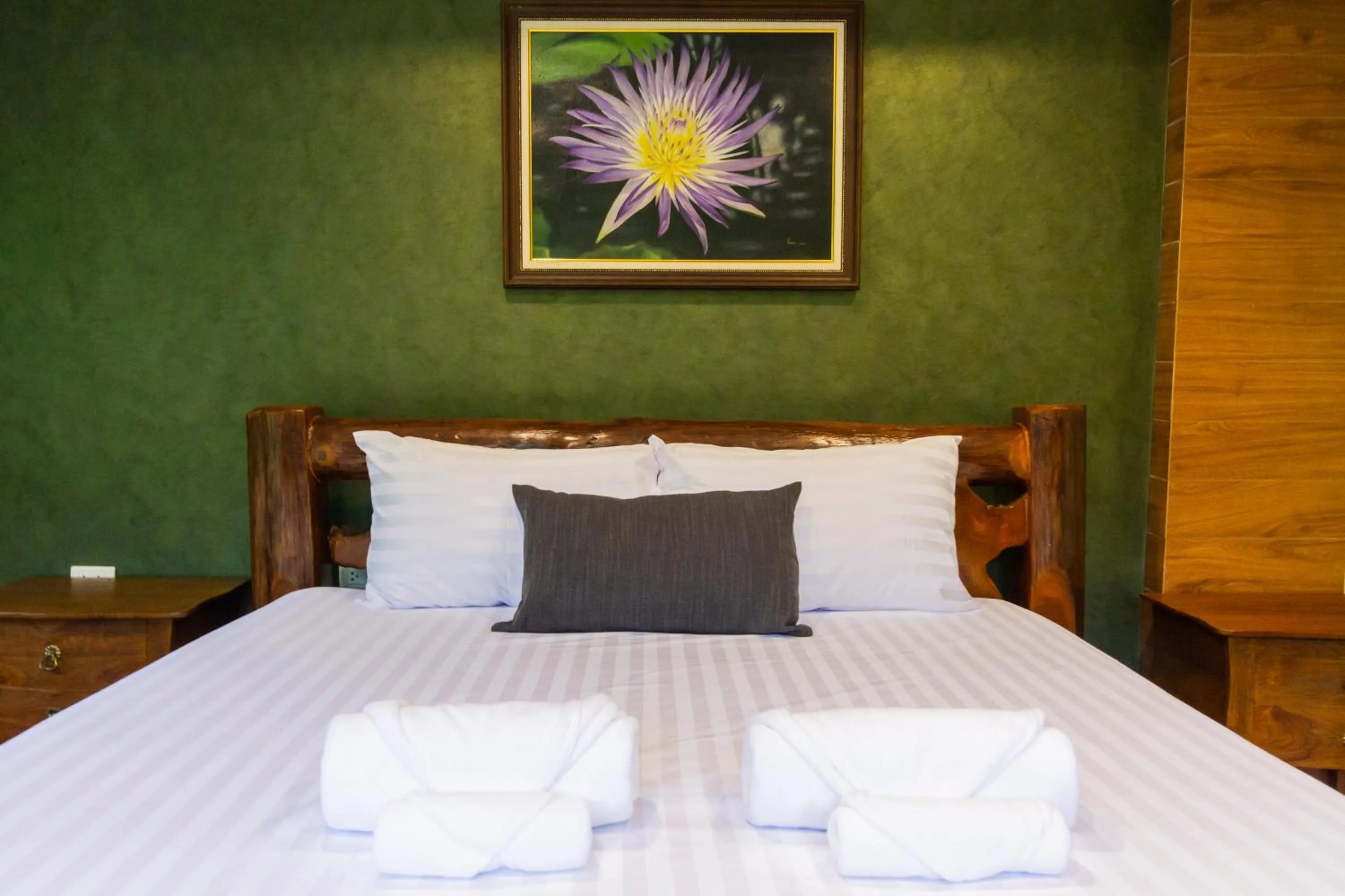 Bed in Namtok Sarika Resotel