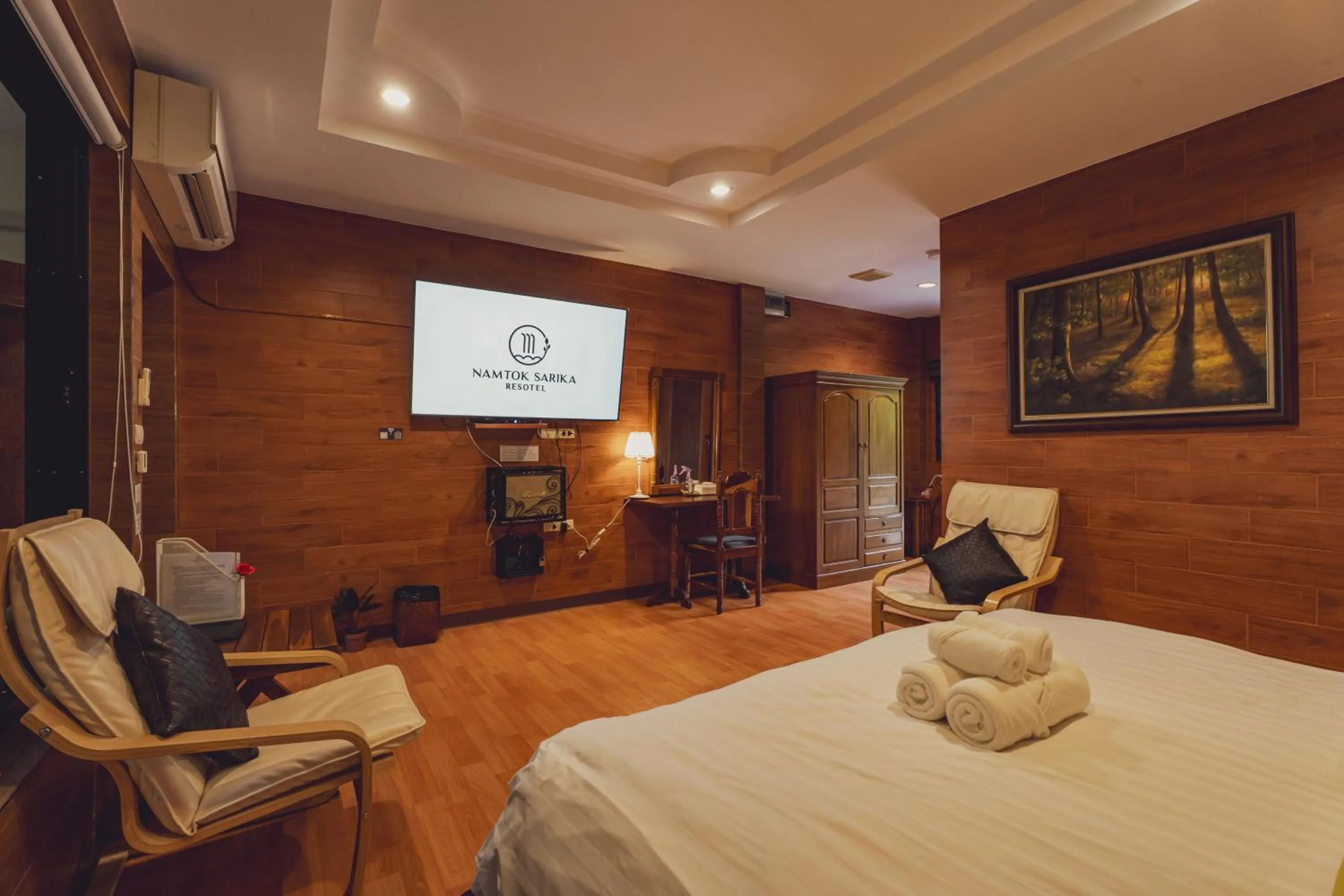 Bed in Namtok Sarika Resotel