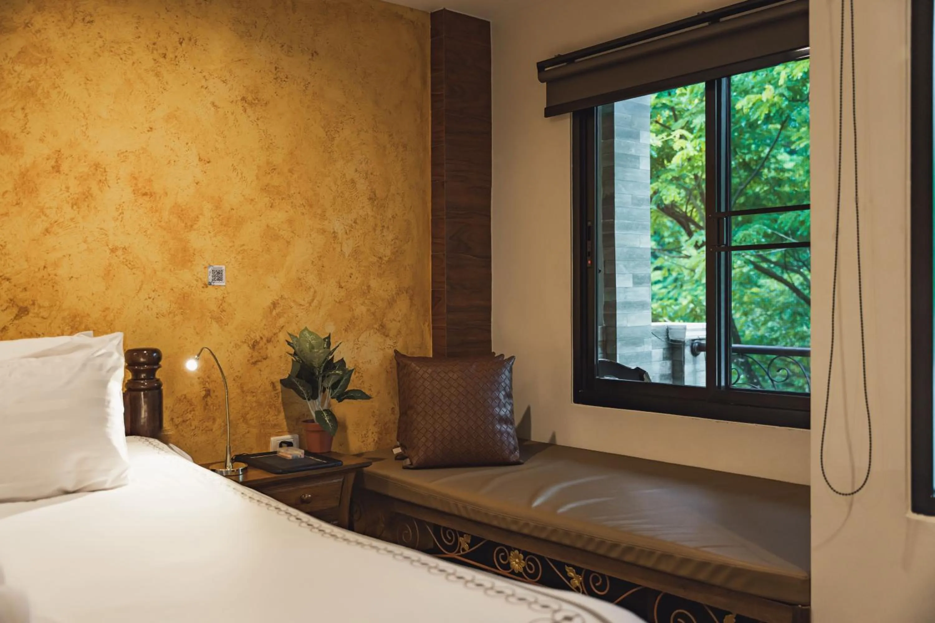 Bed in Namtok Sarika Resotel