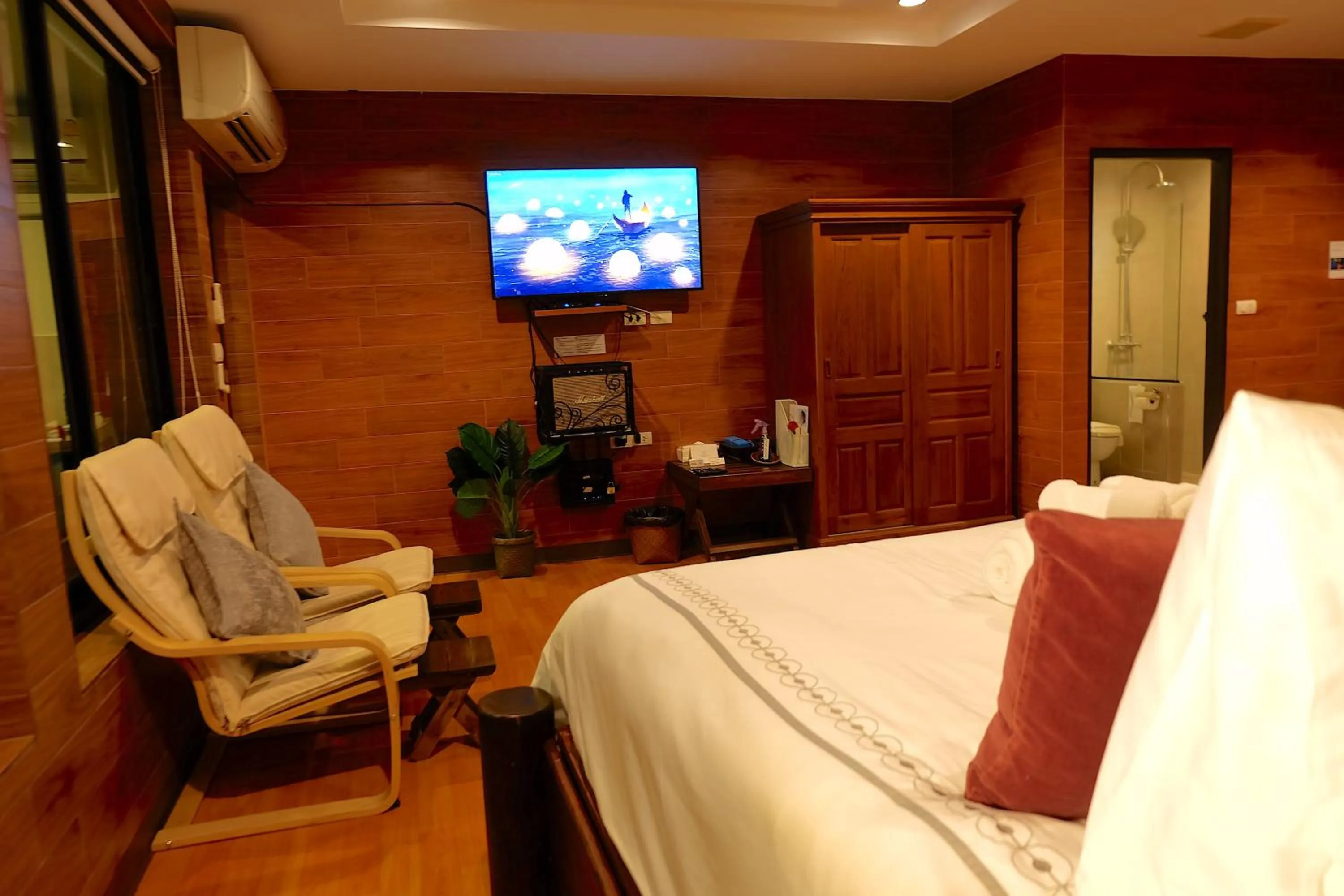 Bed in Namtok Sarika Resotel