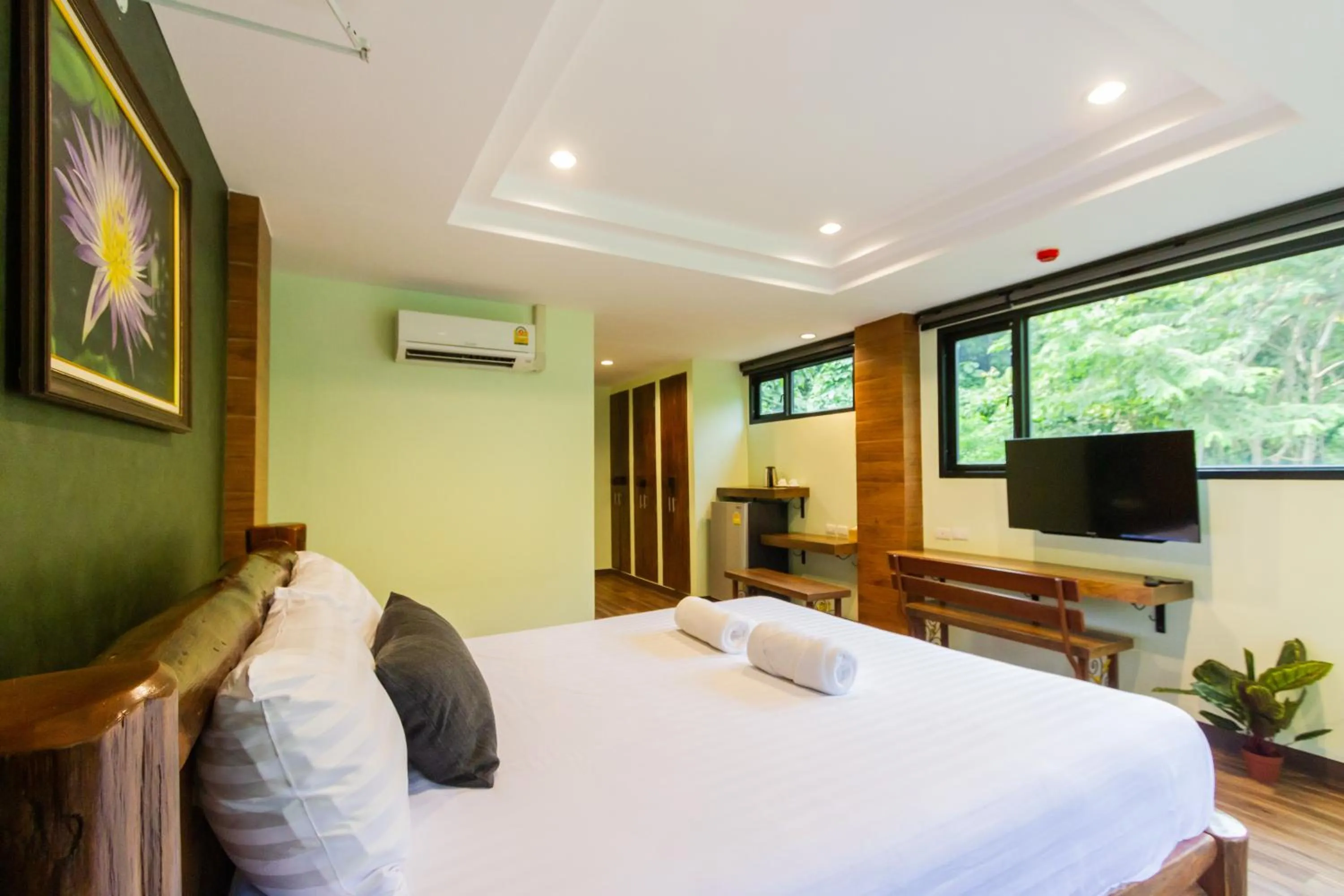 Bed in Namtok Sarika Resotel