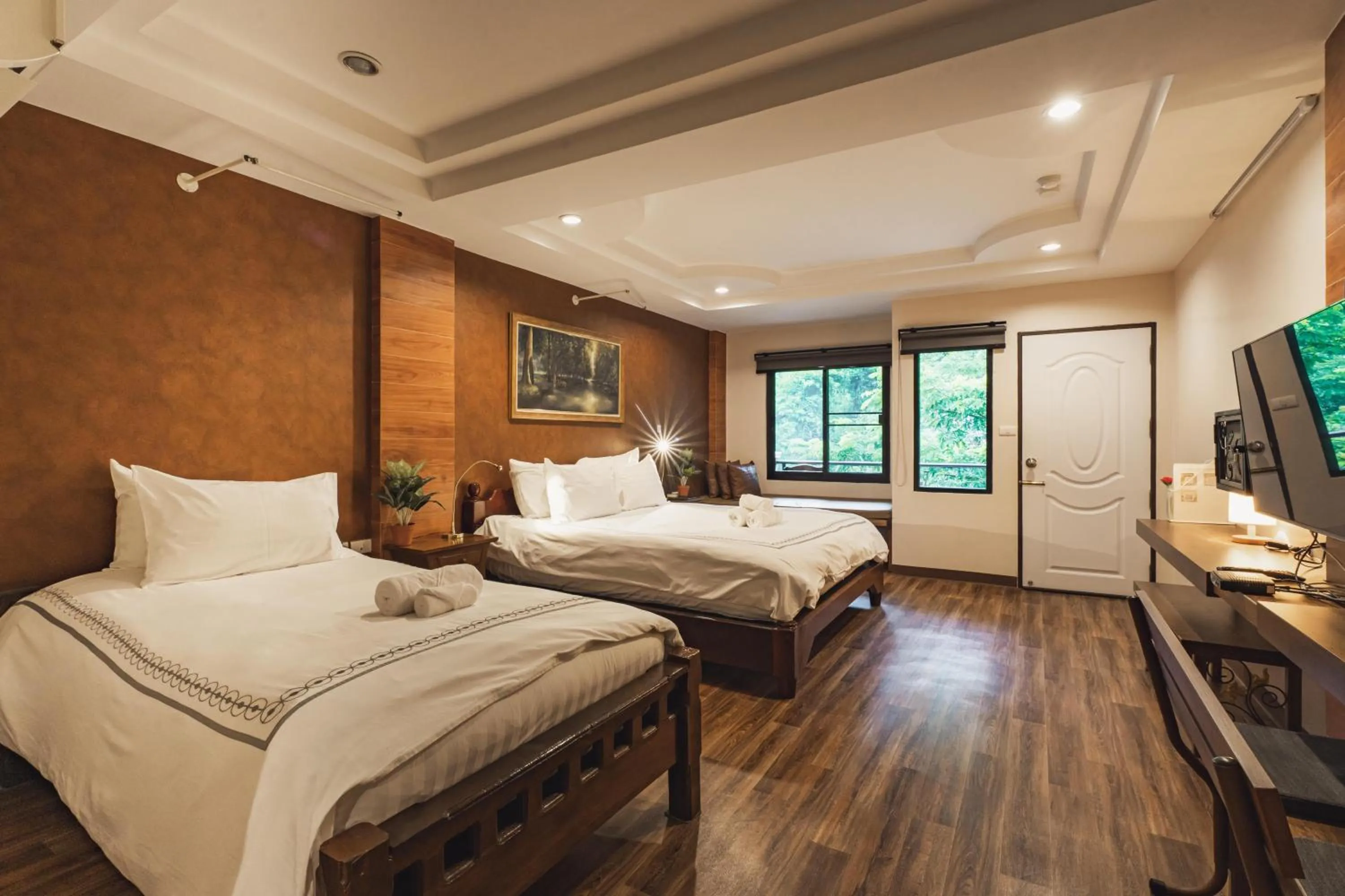 Bed in Namtok Sarika Resotel