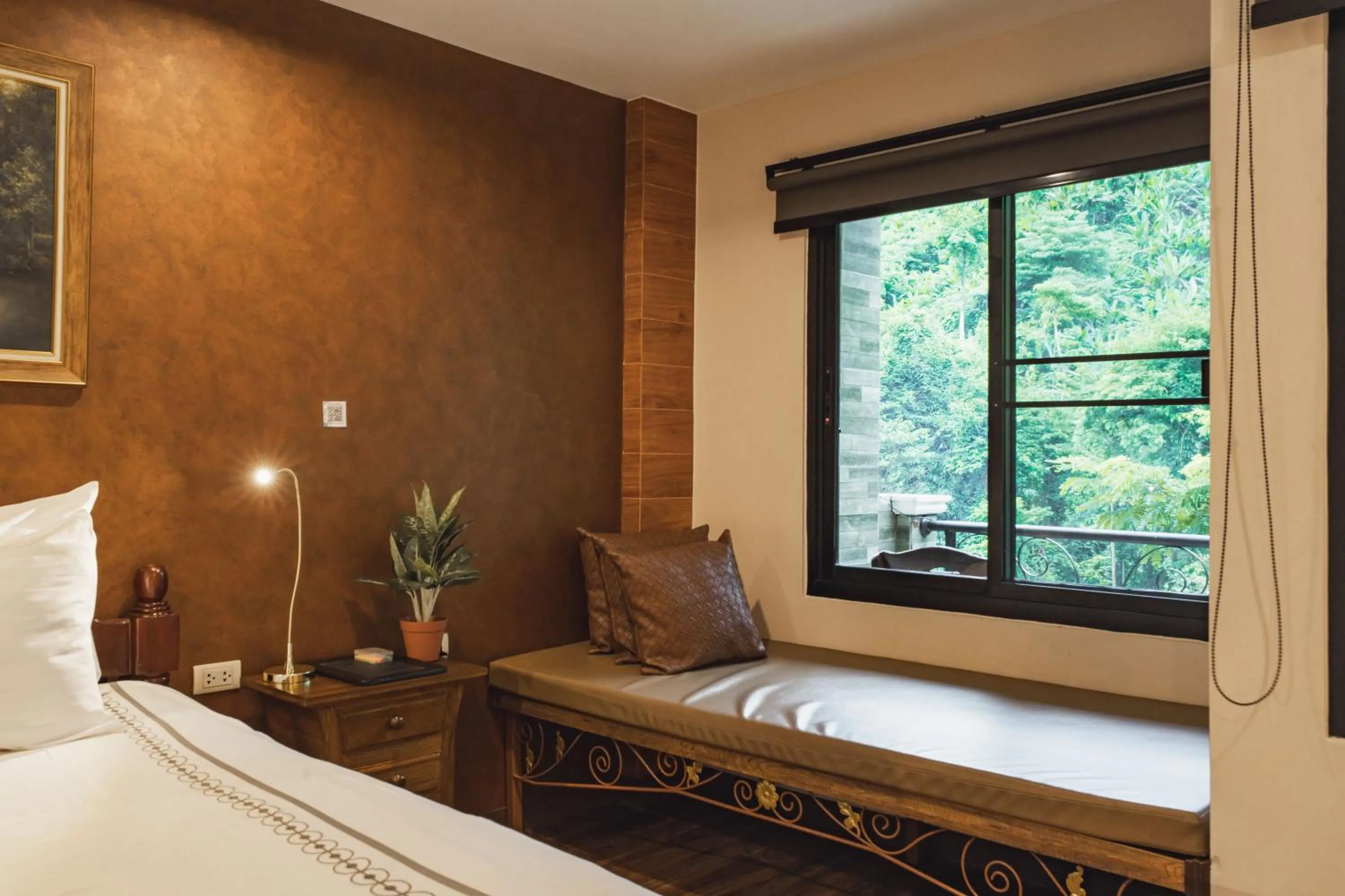 Bed in Namtok Sarika Resotel