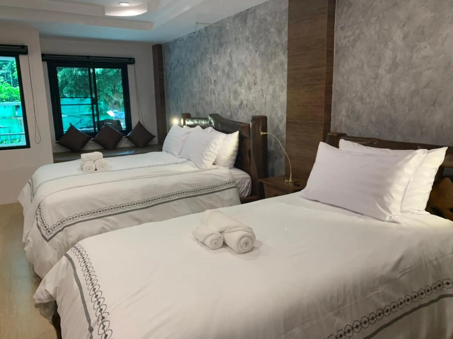 Bed in Namtok Sarika Resotel