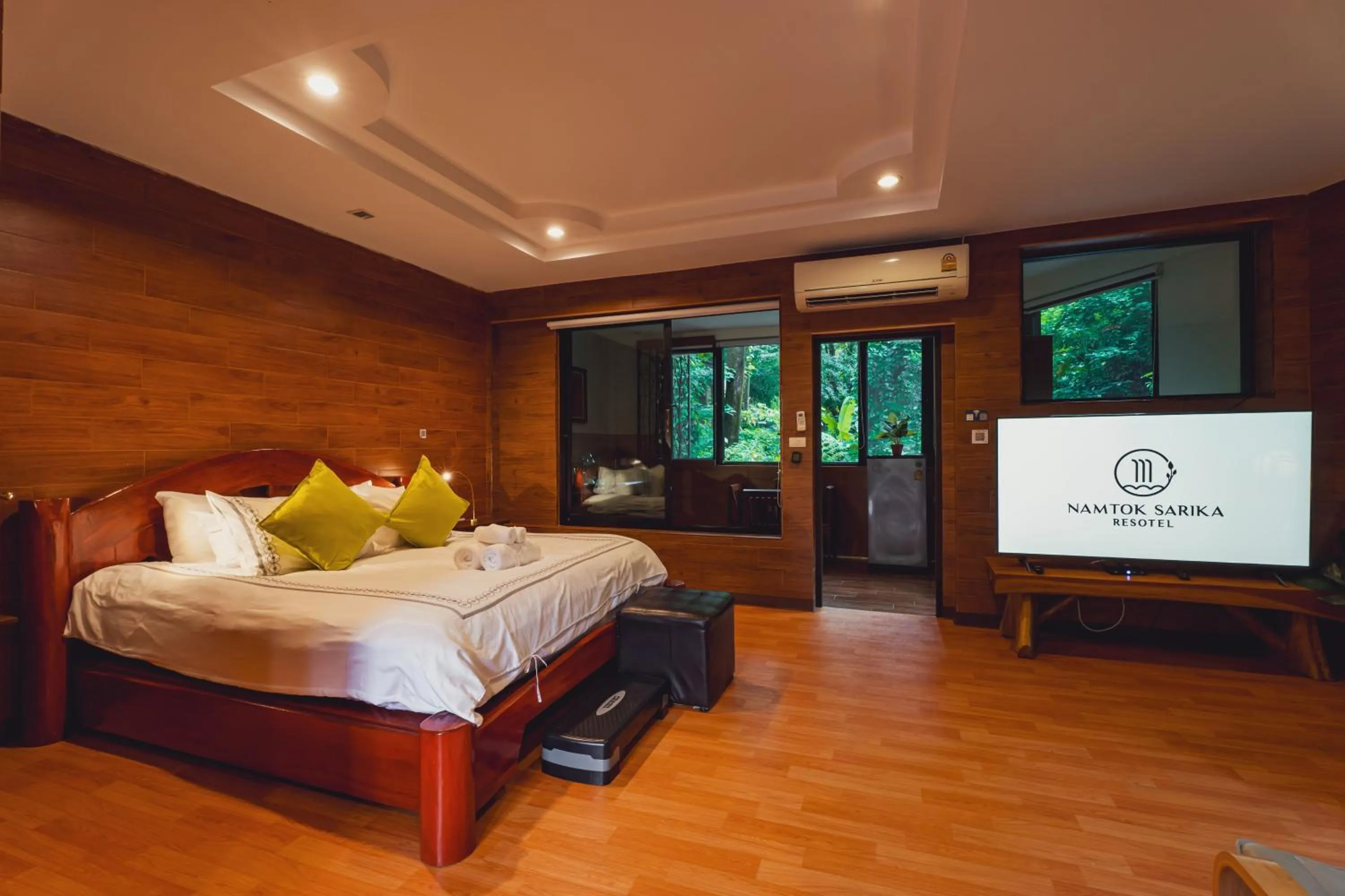 Bed in Namtok Sarika Resotel