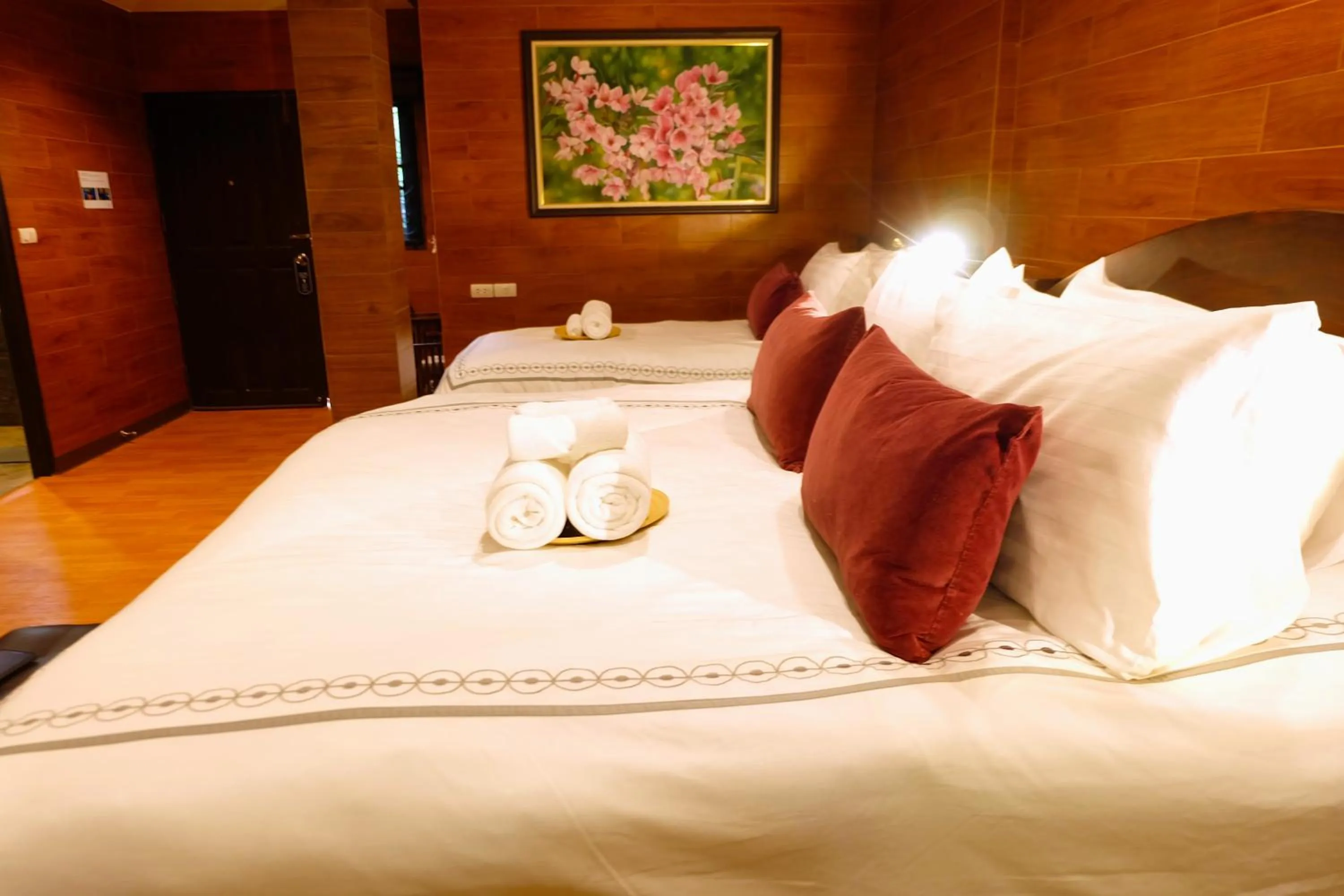 Bed in Namtok Sarika Resotel