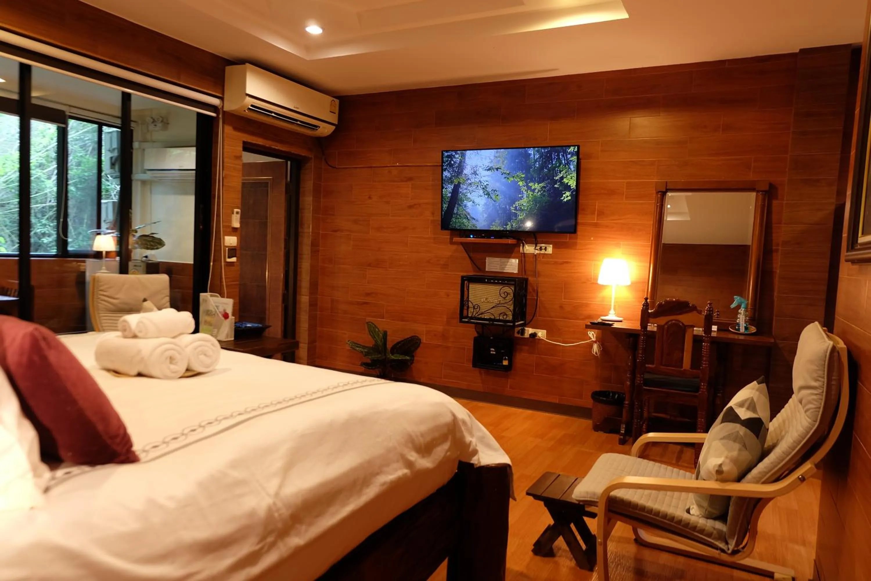 Bed in Namtok Sarika Resotel