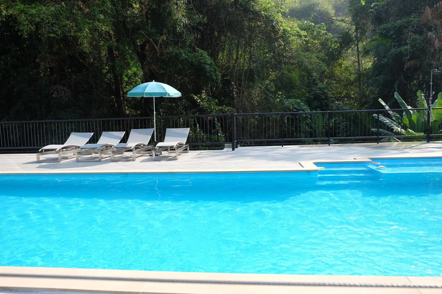 Swimming pool in Namtok Sarika Resotel