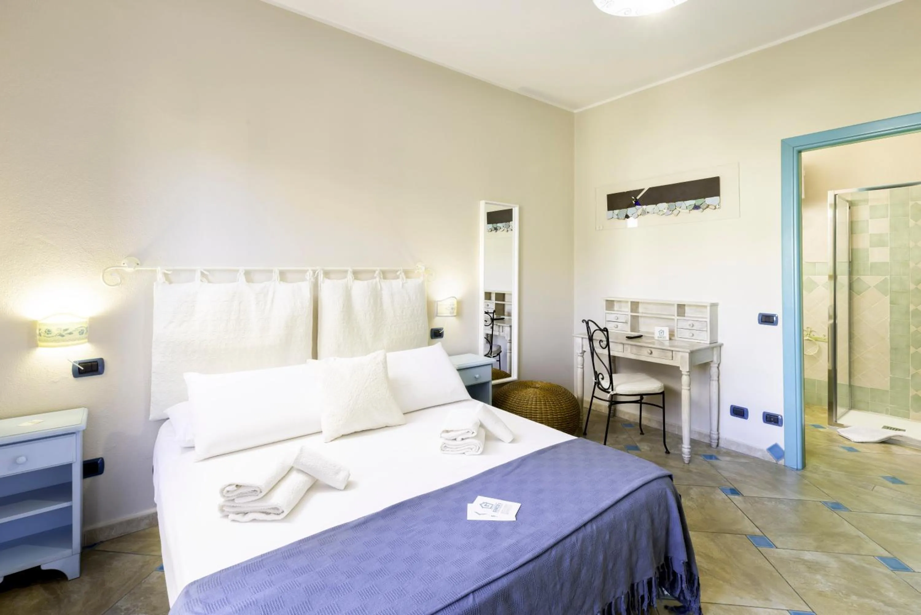 Bed in Giaco's Rooms