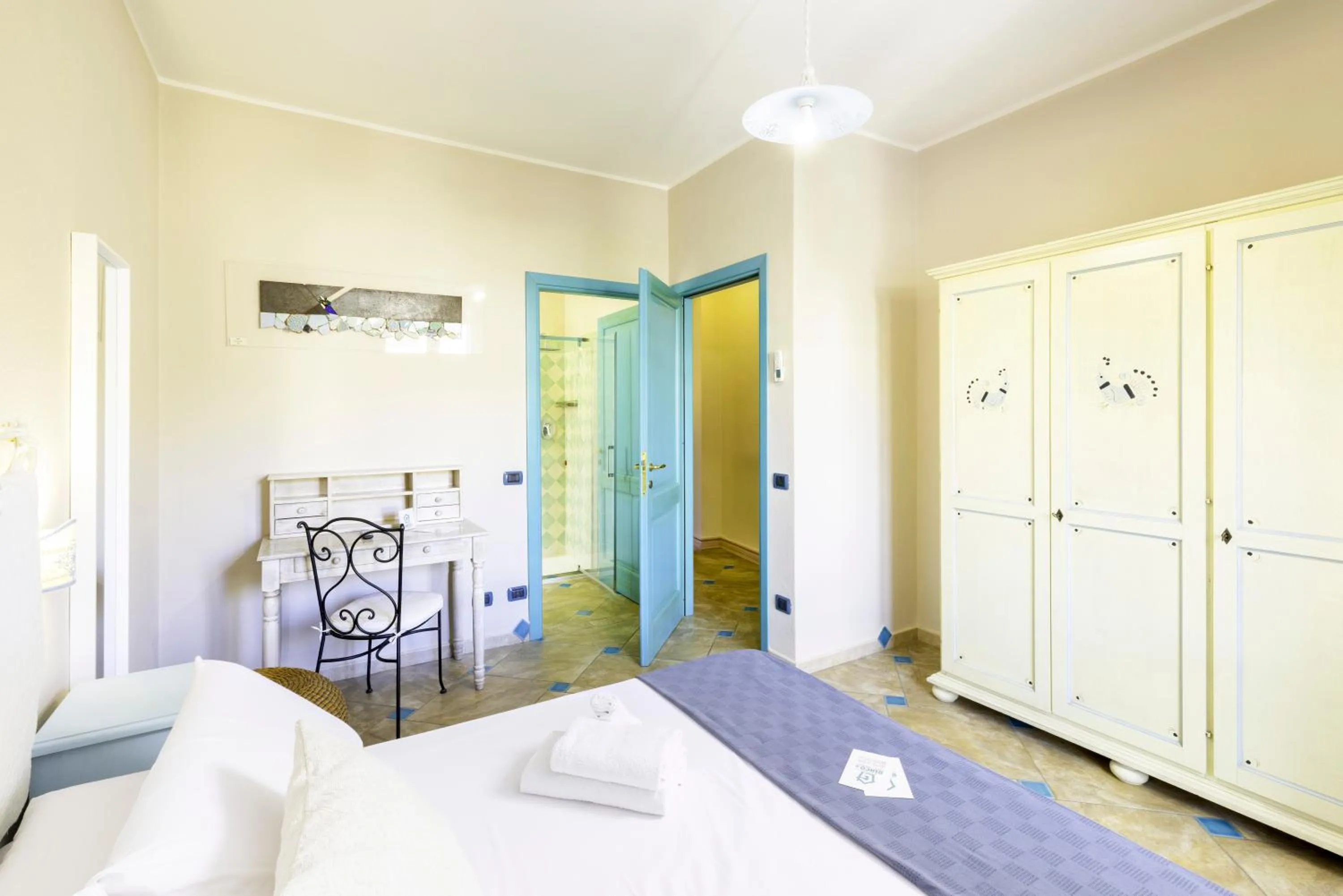 Bed in Giaco's Rooms