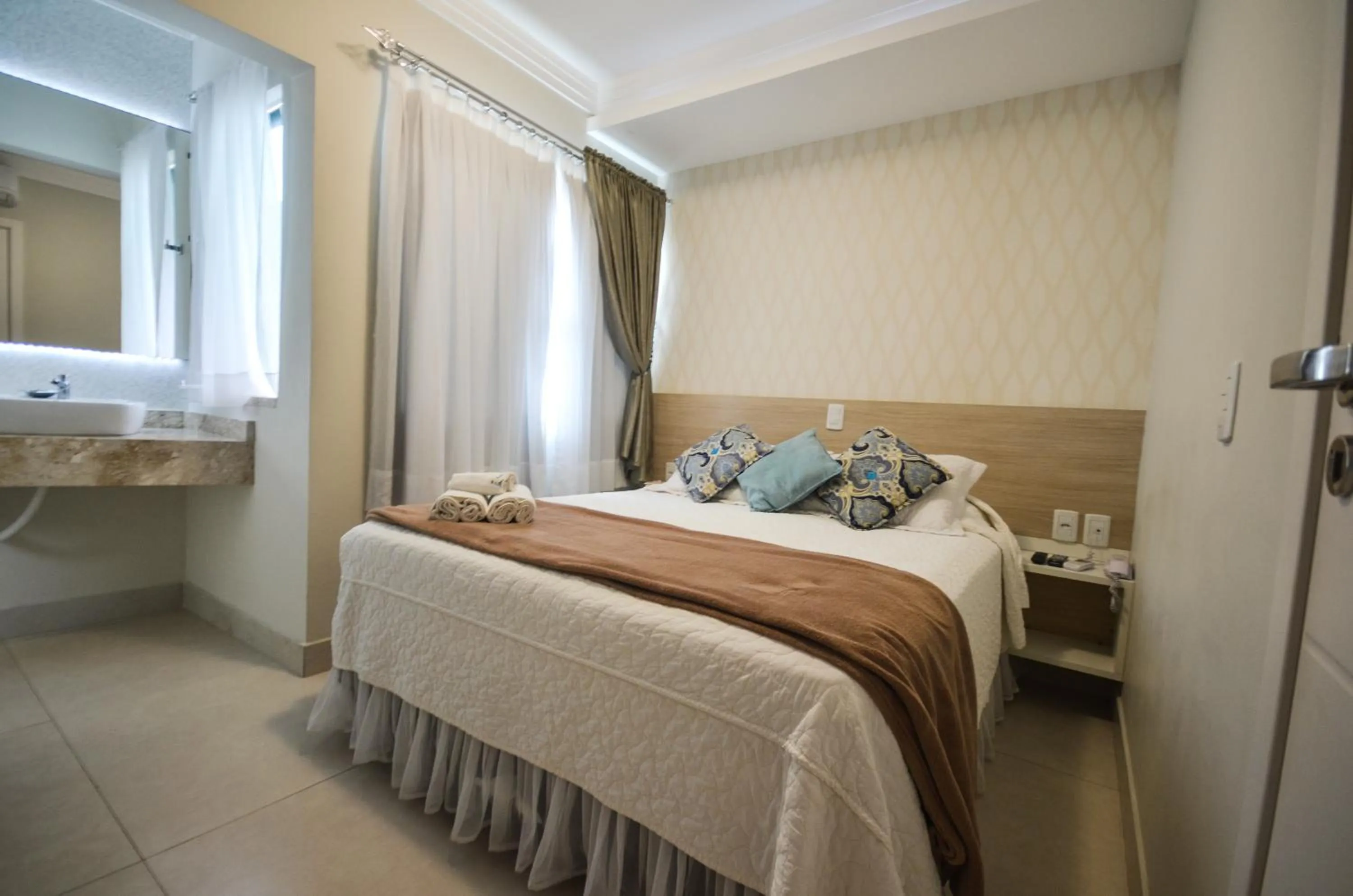 Living room, Bed in Pousada Retiro das Ilhas