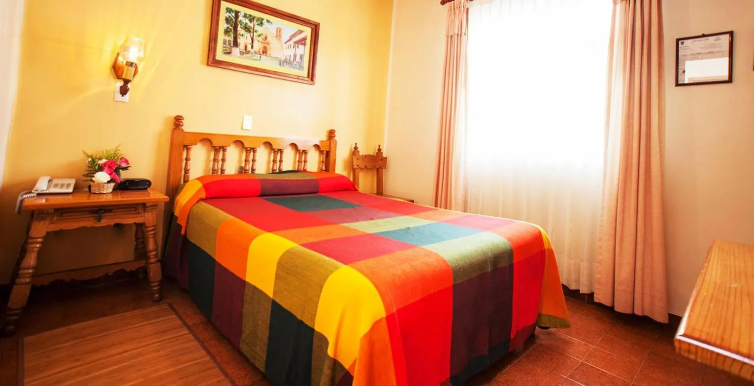 Bed in Gran Hotel Pátzcuaro
