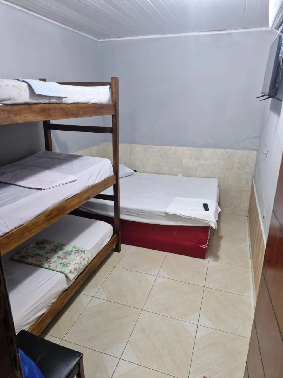 Bed in Kitnets com AR Condicionado na Praia