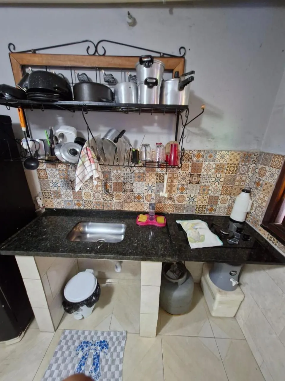 Kitchen or kitchenette in Kitnets com AR Condicionado na Praia