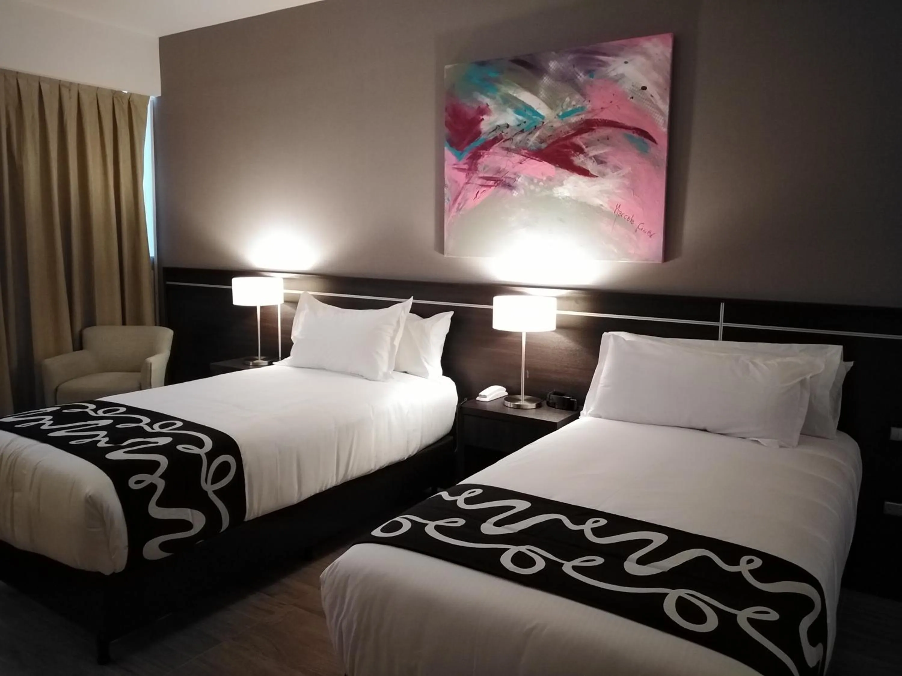 Bed in Amerian Rafaela Hotel