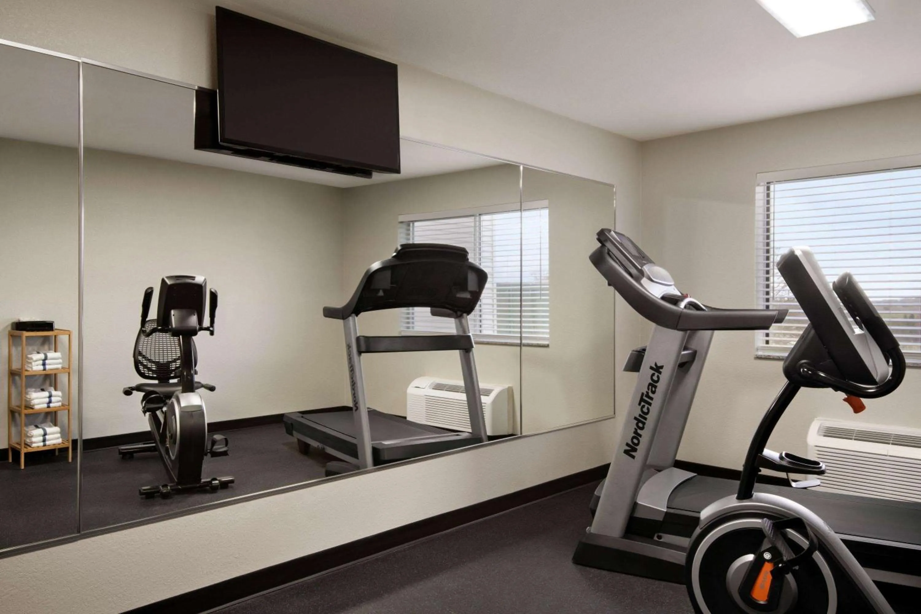 Fitness centre/facilities in AmericInn by Wyndham Dodgeville