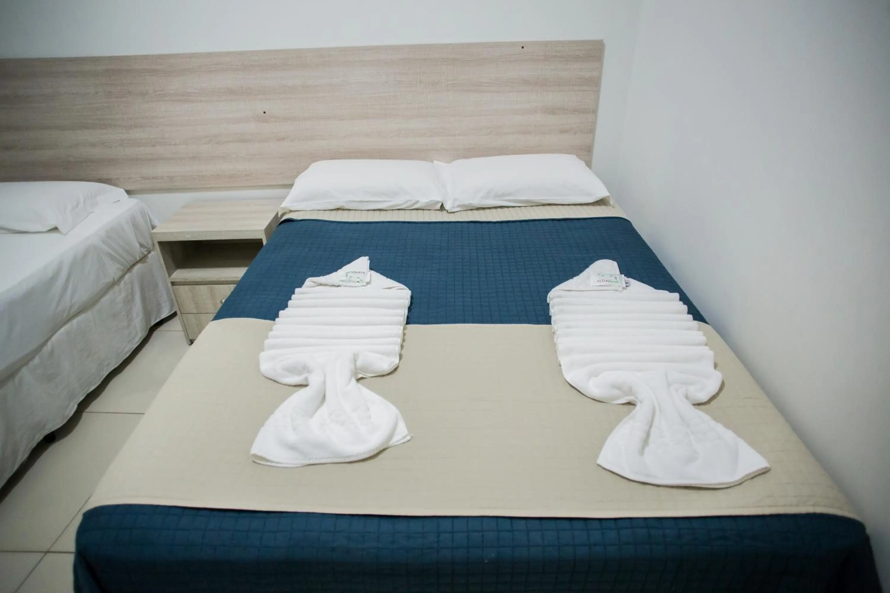 Bed in Pousada Orla dos Corais