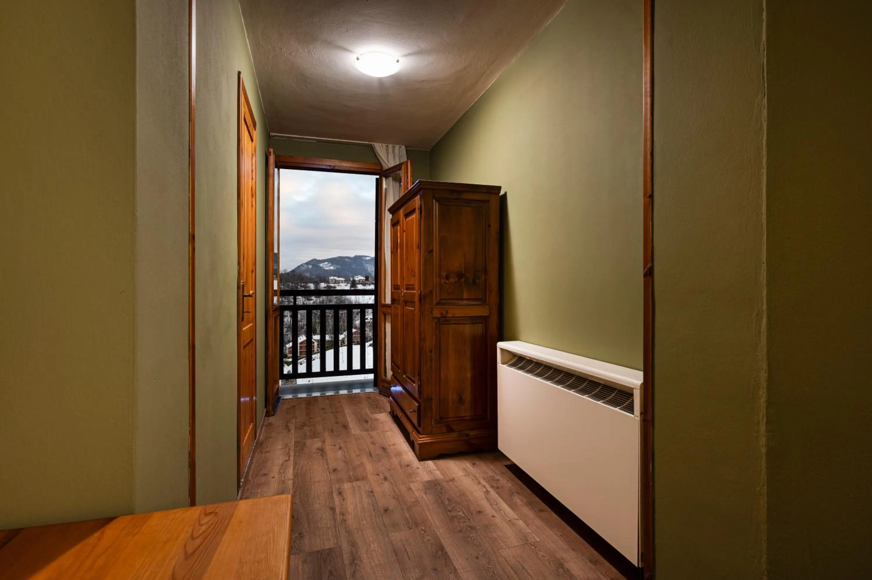 Bedroom in Hotel Miramonti Family & SPA