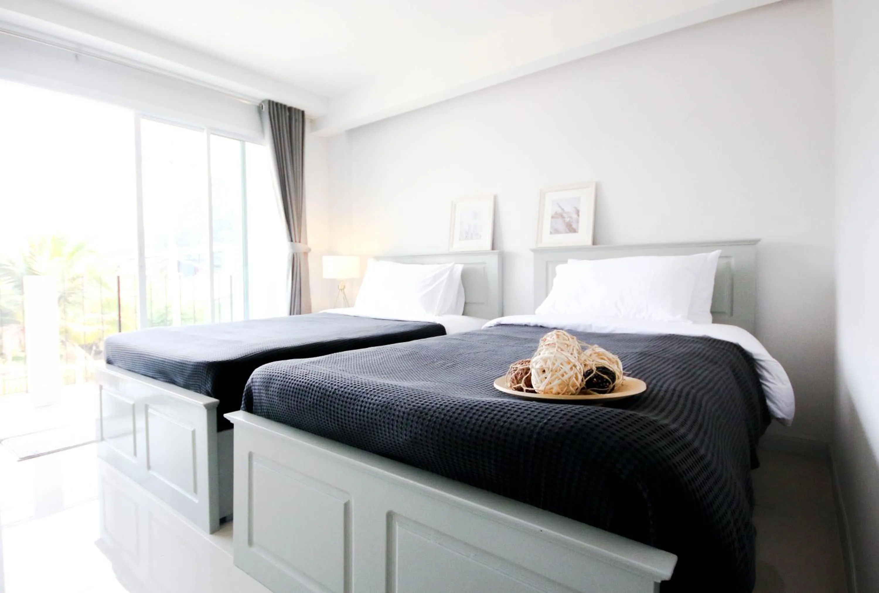 Bed in Tonkla Boutique Hotel