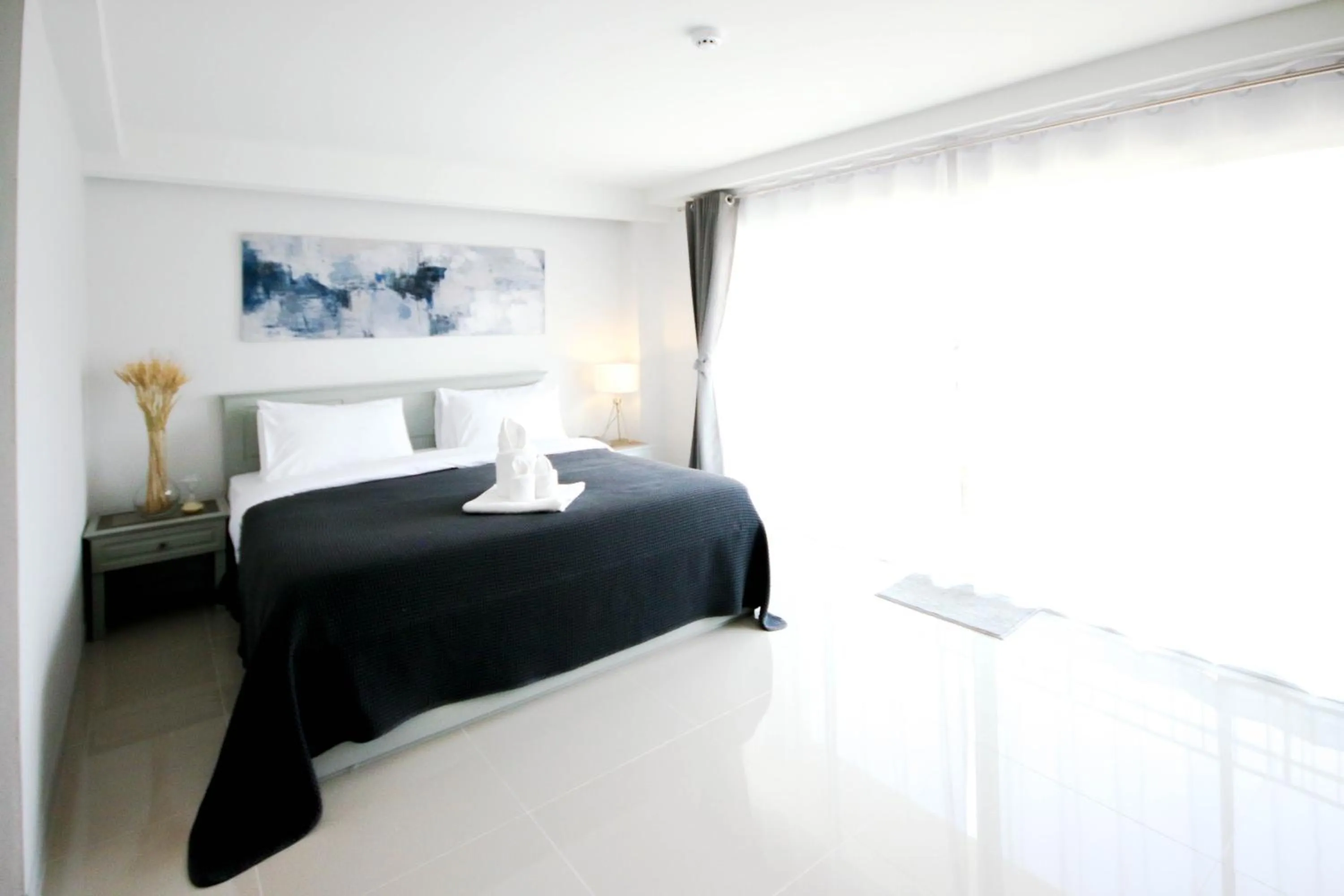 Bed in Tonkla Boutique Hotel