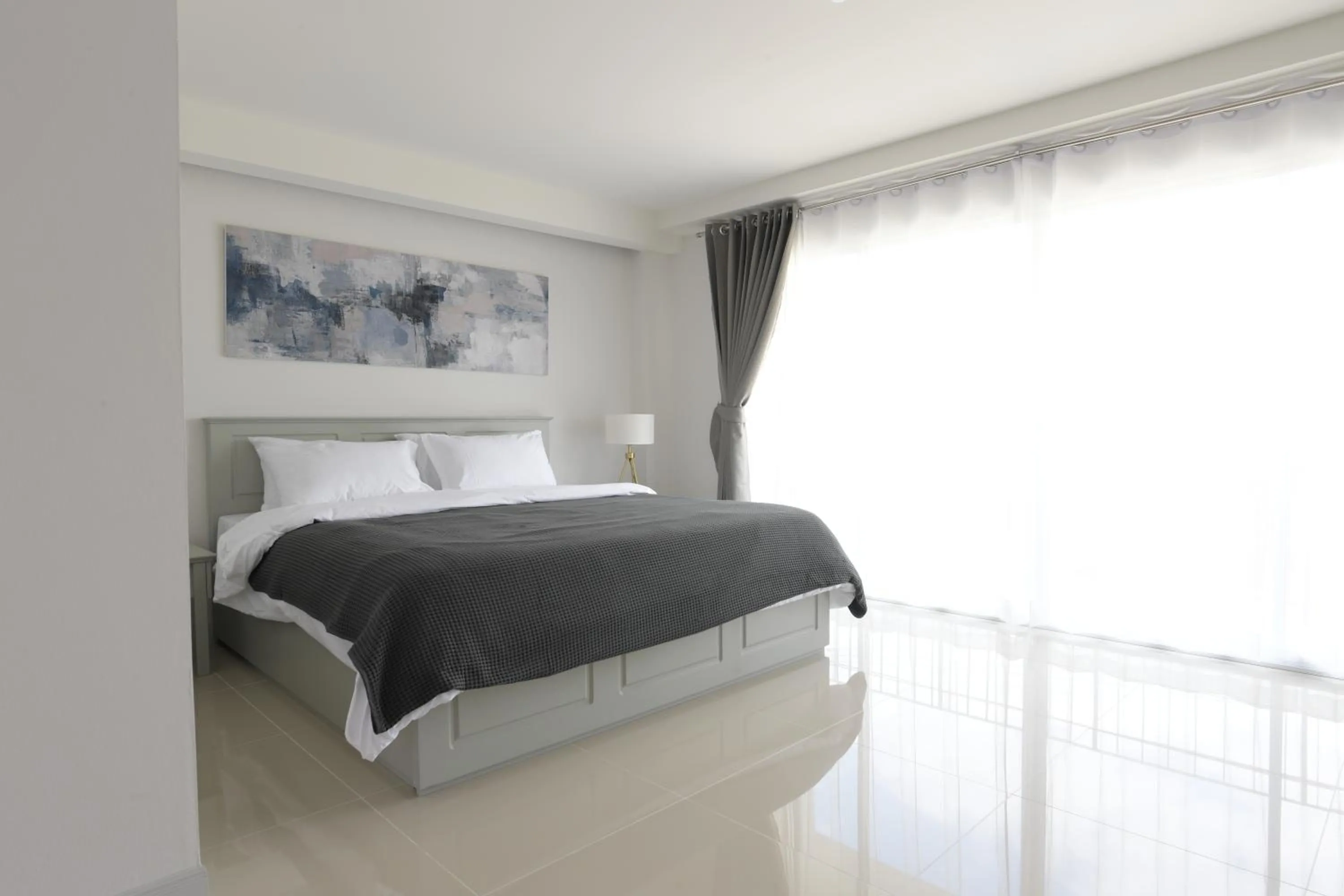 Bed in Tonkla Boutique Hotel