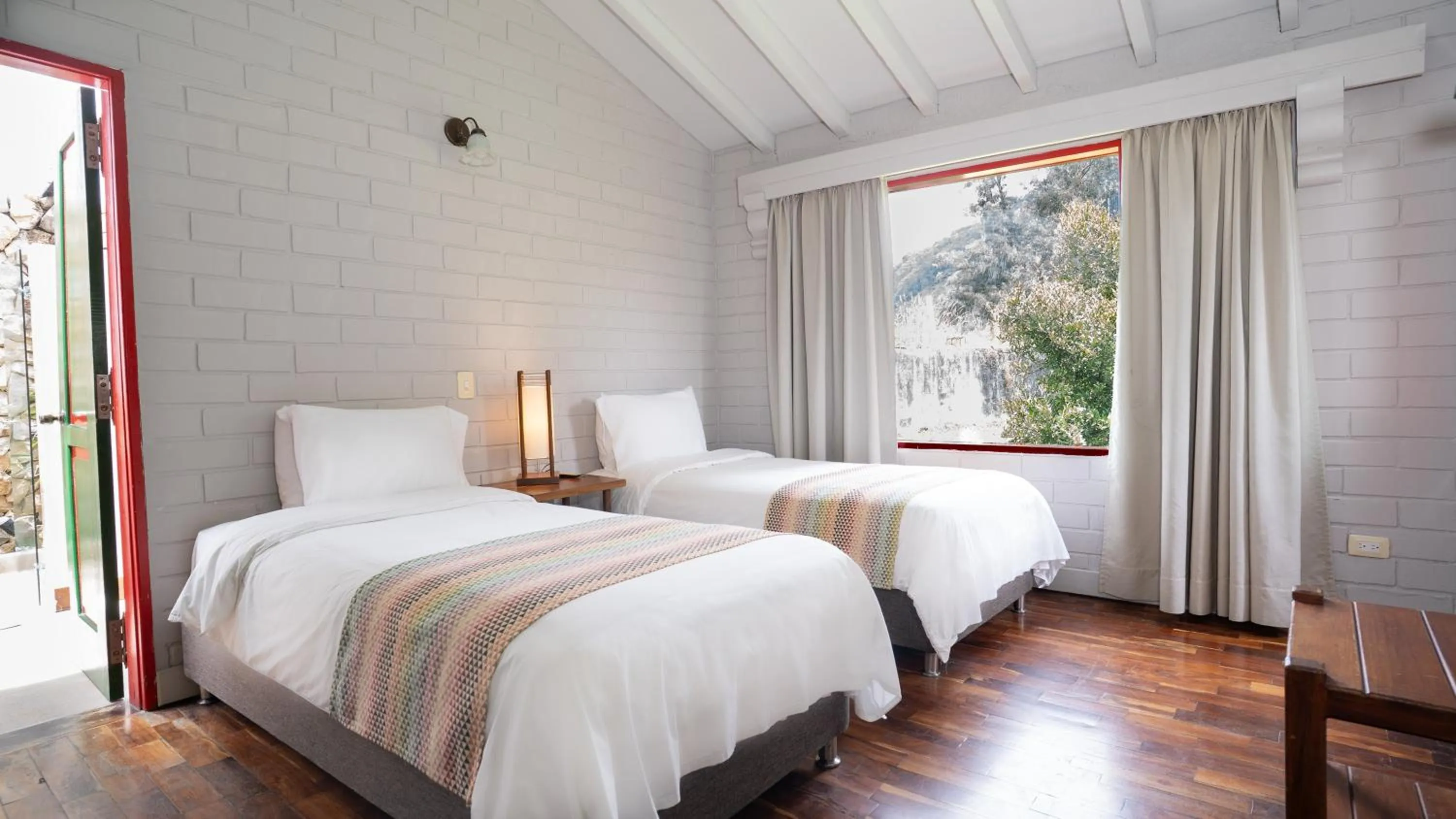 Photo of the whole room, Bed in Termales El Otoño