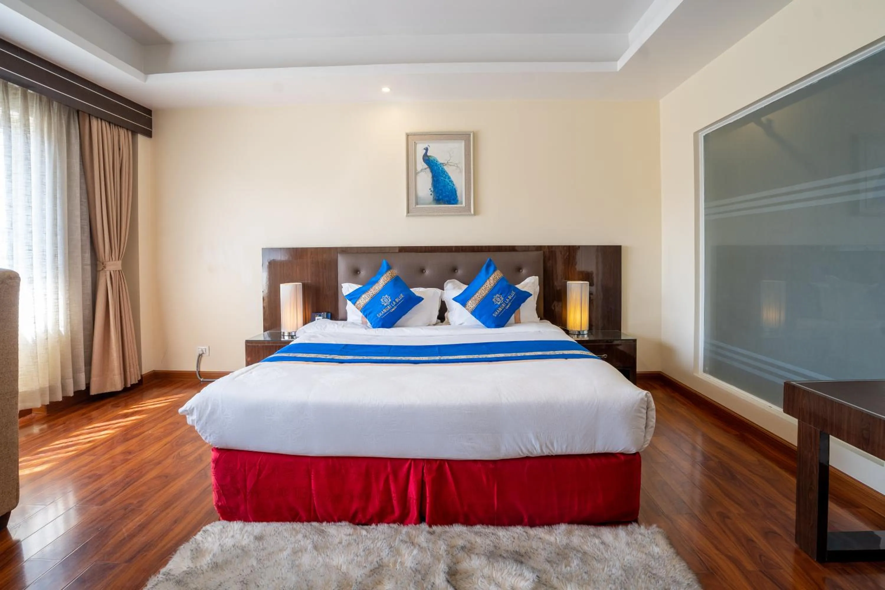 Bed in Shangrila Blu Hotel