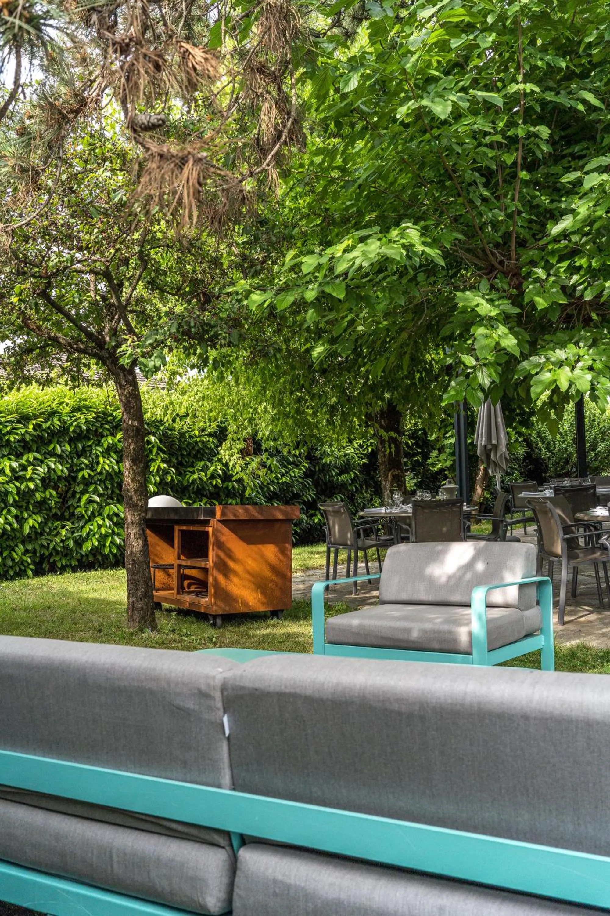 Garden view in PoMo Hôtel & Restaurant