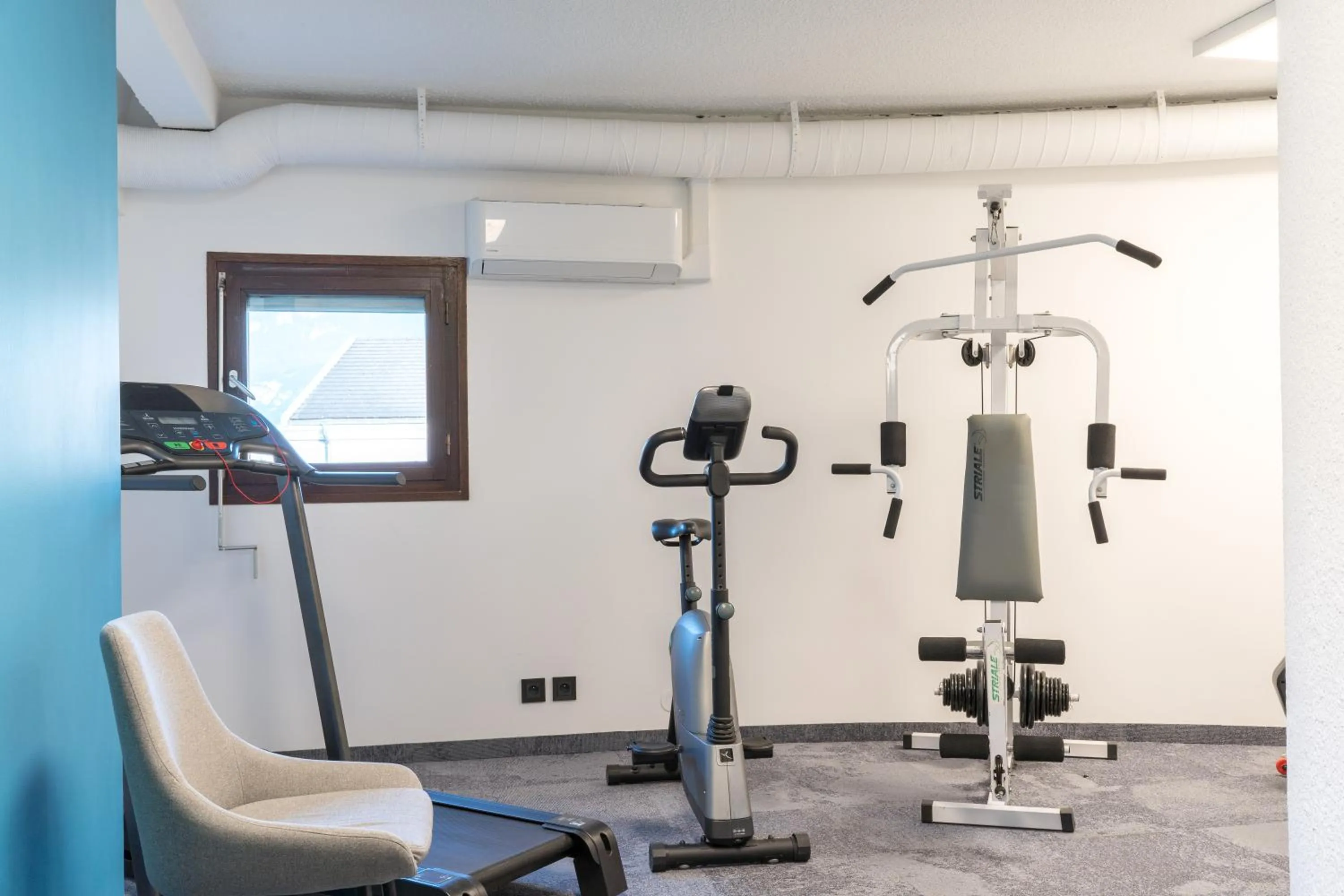 Fitness centre/facilities in PoMo Hôtel & Restaurant