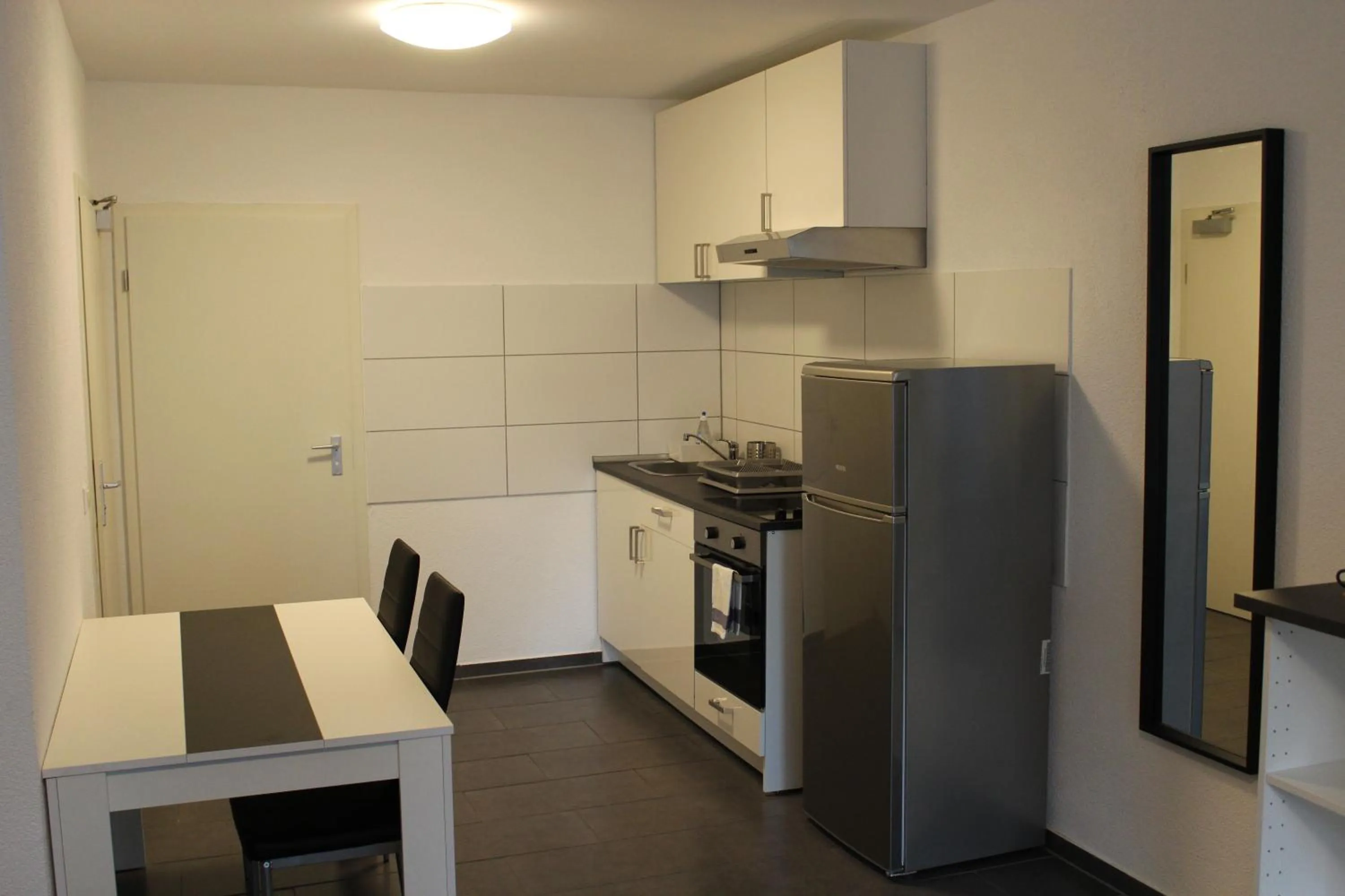 Kitchen or kitchenette in Libarty Appartments
