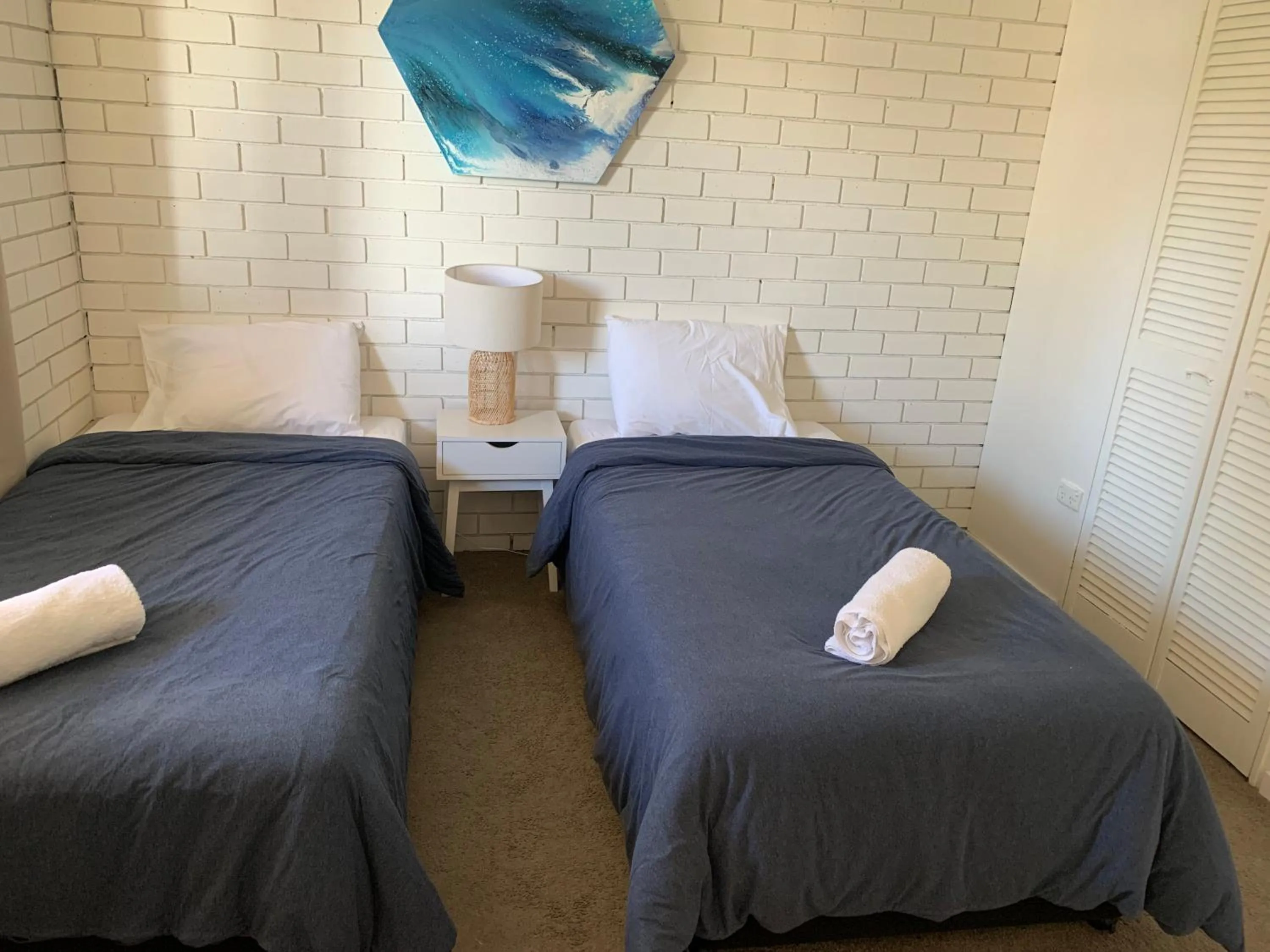 Bed in Northpoint Holiday Apartments