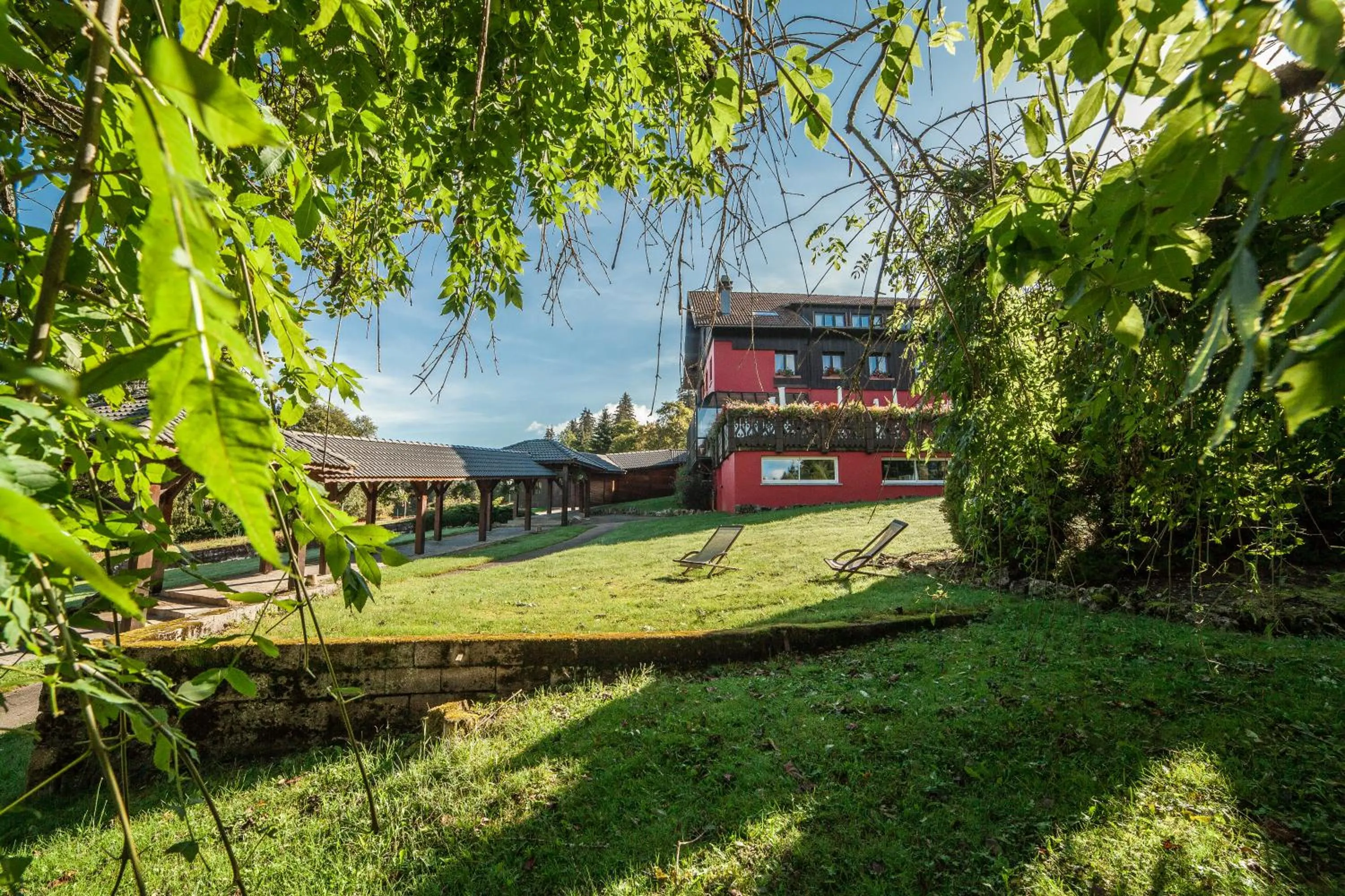 Property building in Hôtel Restaurant Spa Les Jardins De Sophie