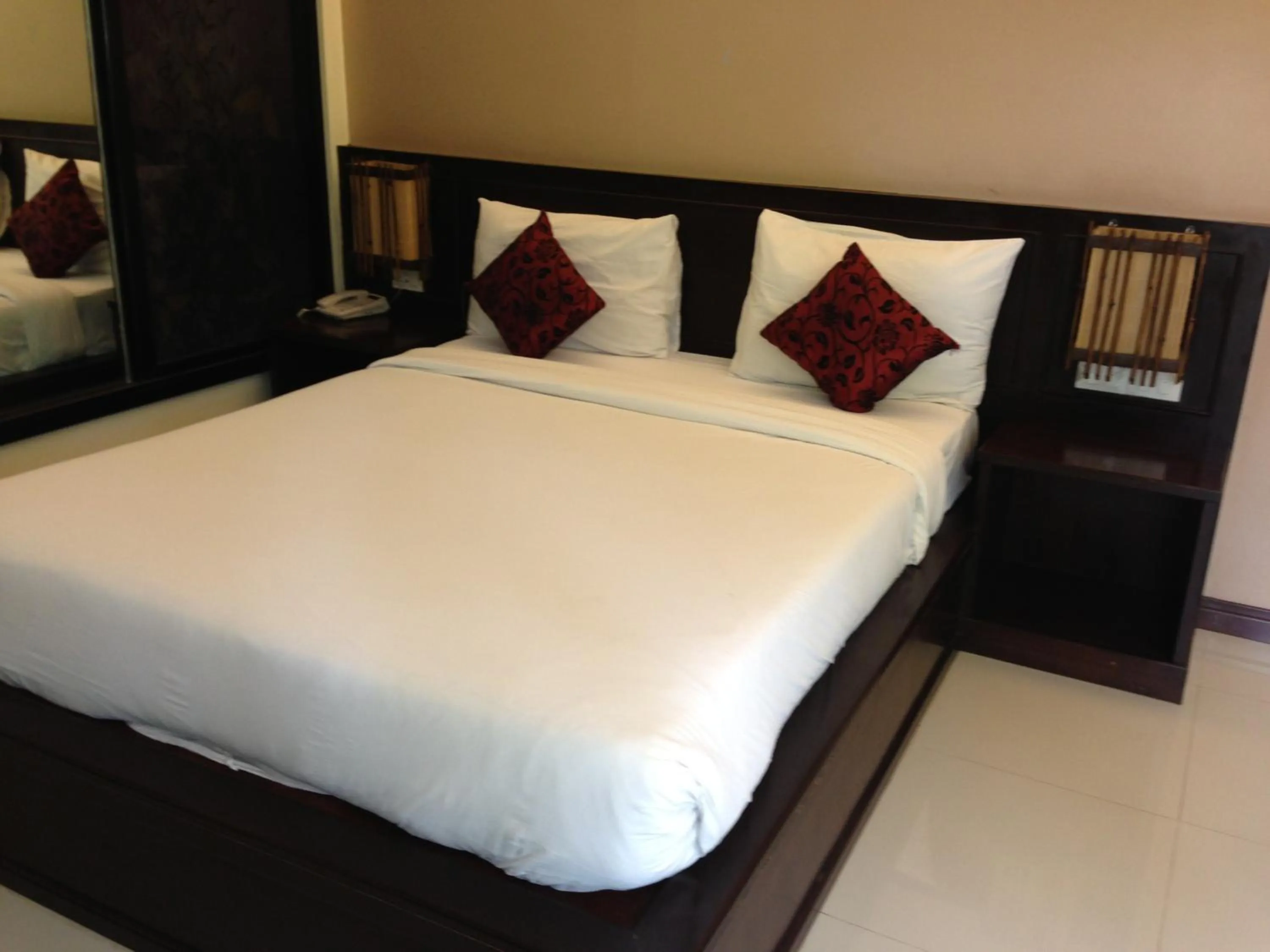 Bed in Palm Sweet Resort