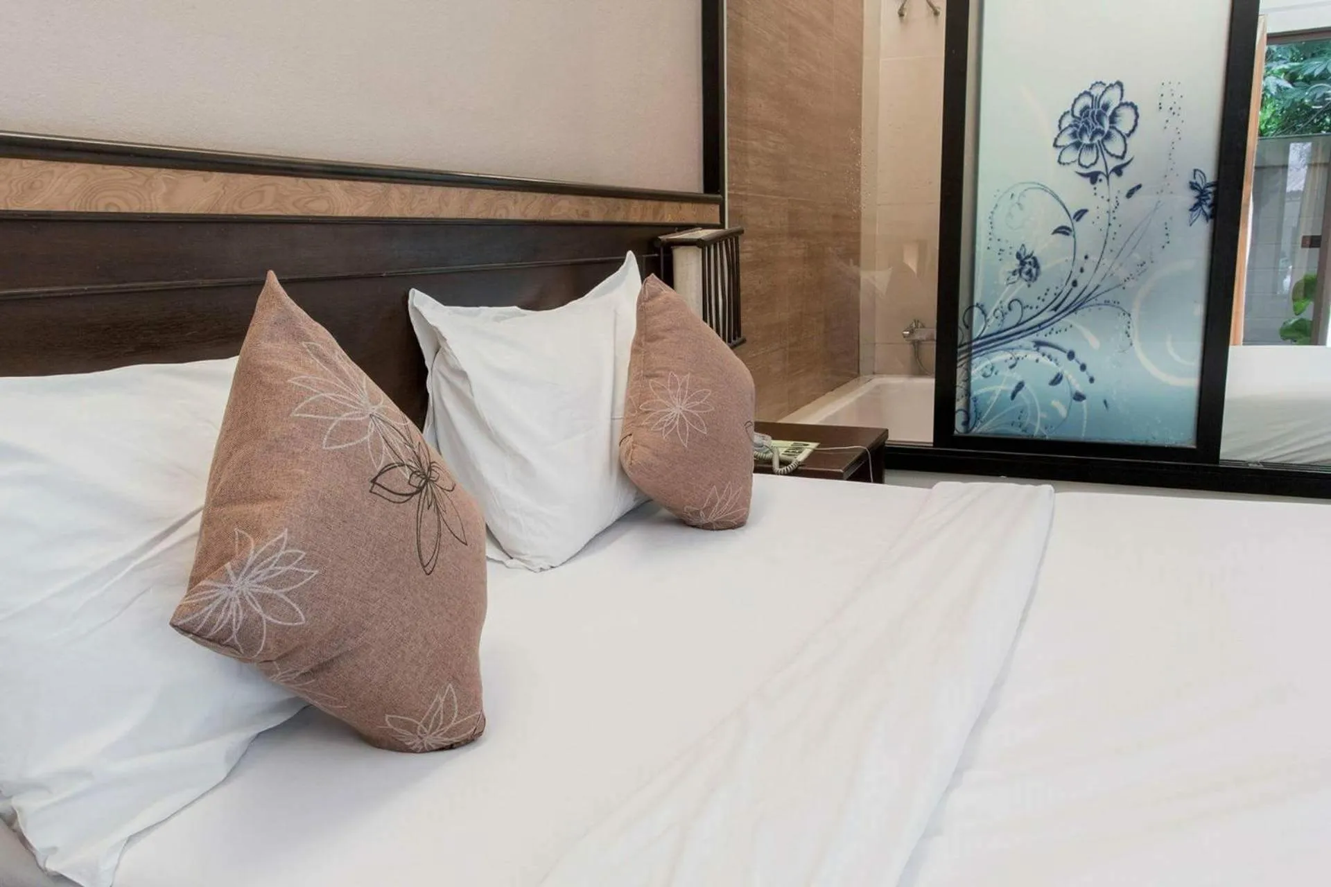 Bed in Palm Sweet Resort