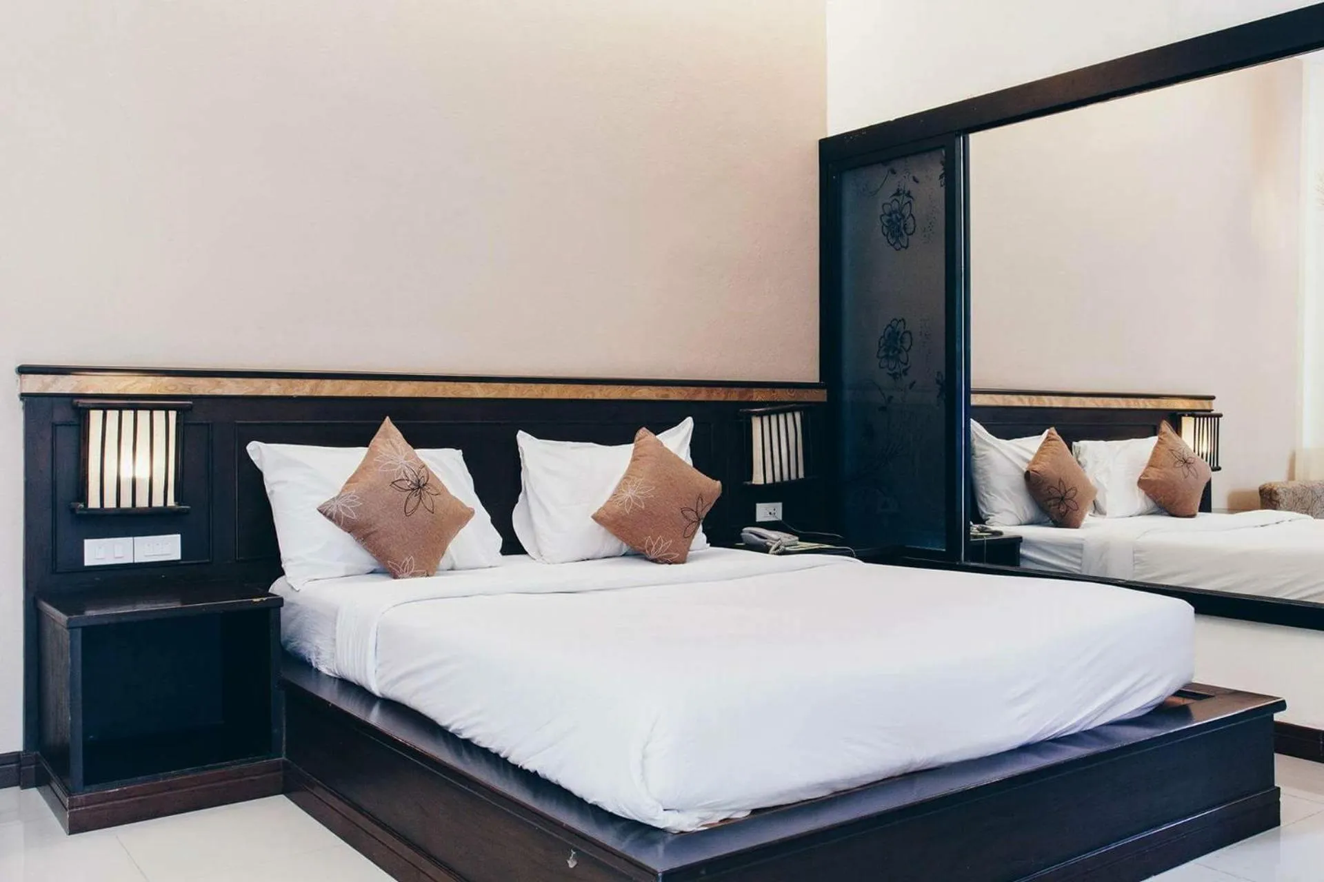 Bed in Palm Sweet Resort