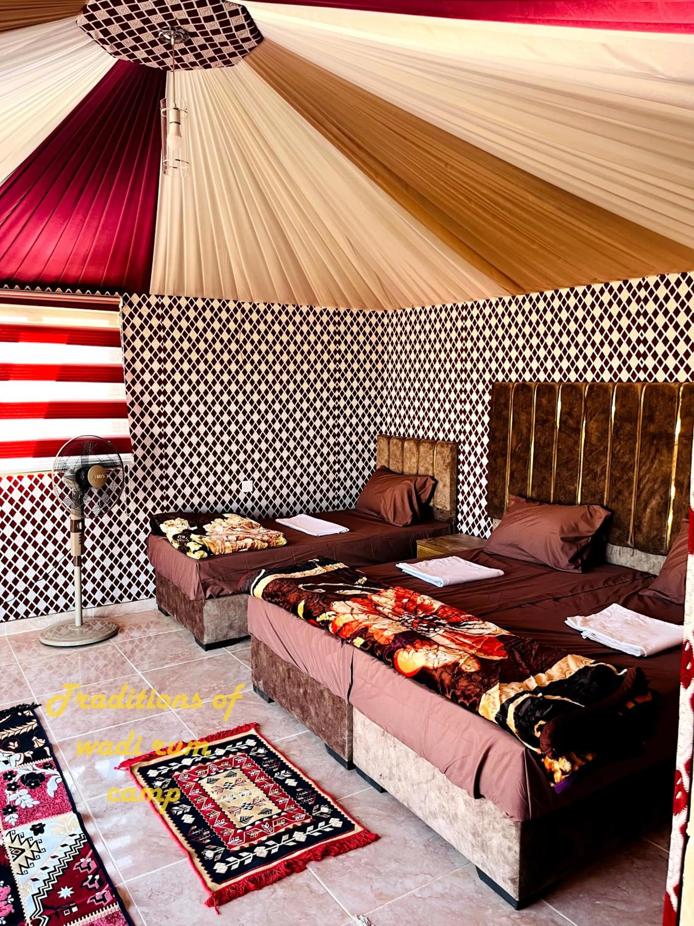 Bed in Traditions of Wadi Rum camp & jeep tour